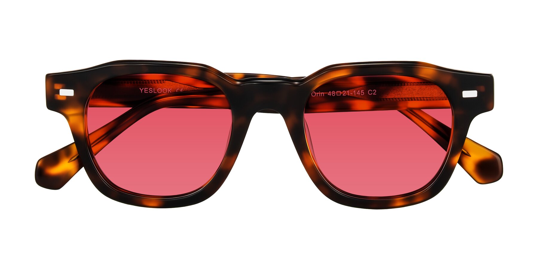 Folded Front of Orin in Tortoise with Red Tinted Lenses