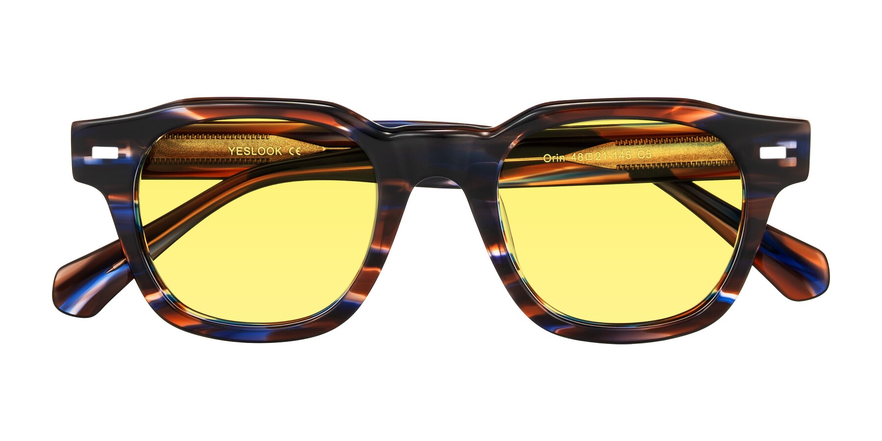 Folded Front of Orin in Brown Blue Striped with Medium Yellow Tinted Lenses