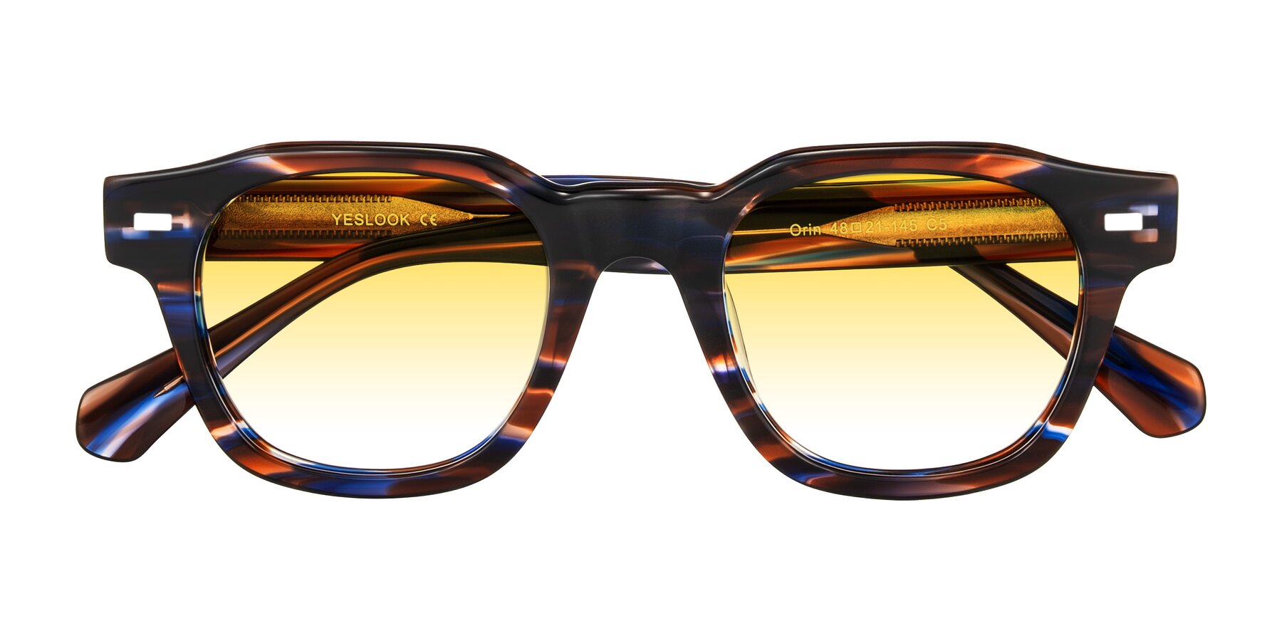 Folded Front of Orin in Brown Blue Striped with Yellow Gradient Lenses