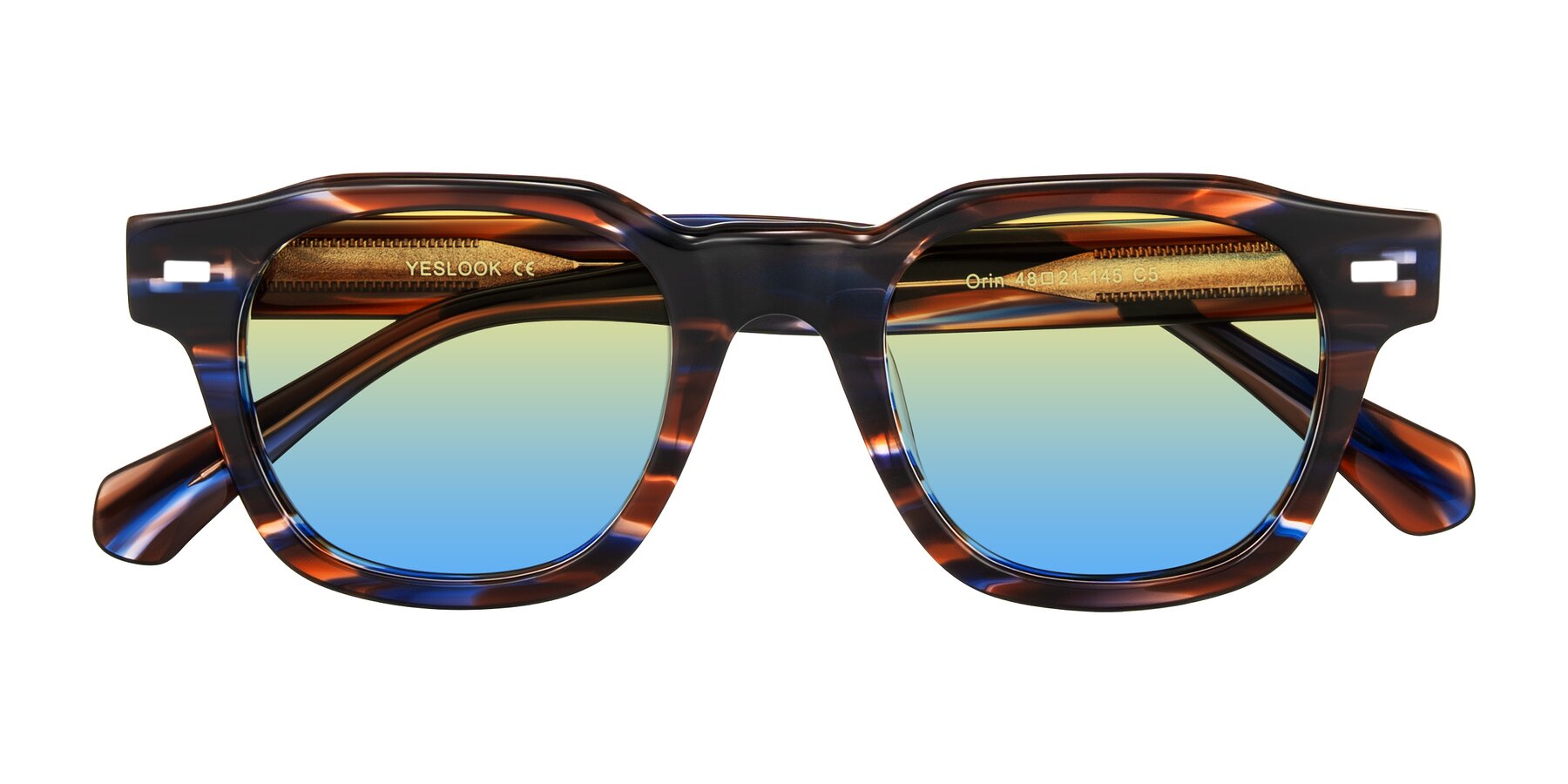 Folded Front of Orin in Brown Blue Striped with Yellow / Blue Gradient Lenses