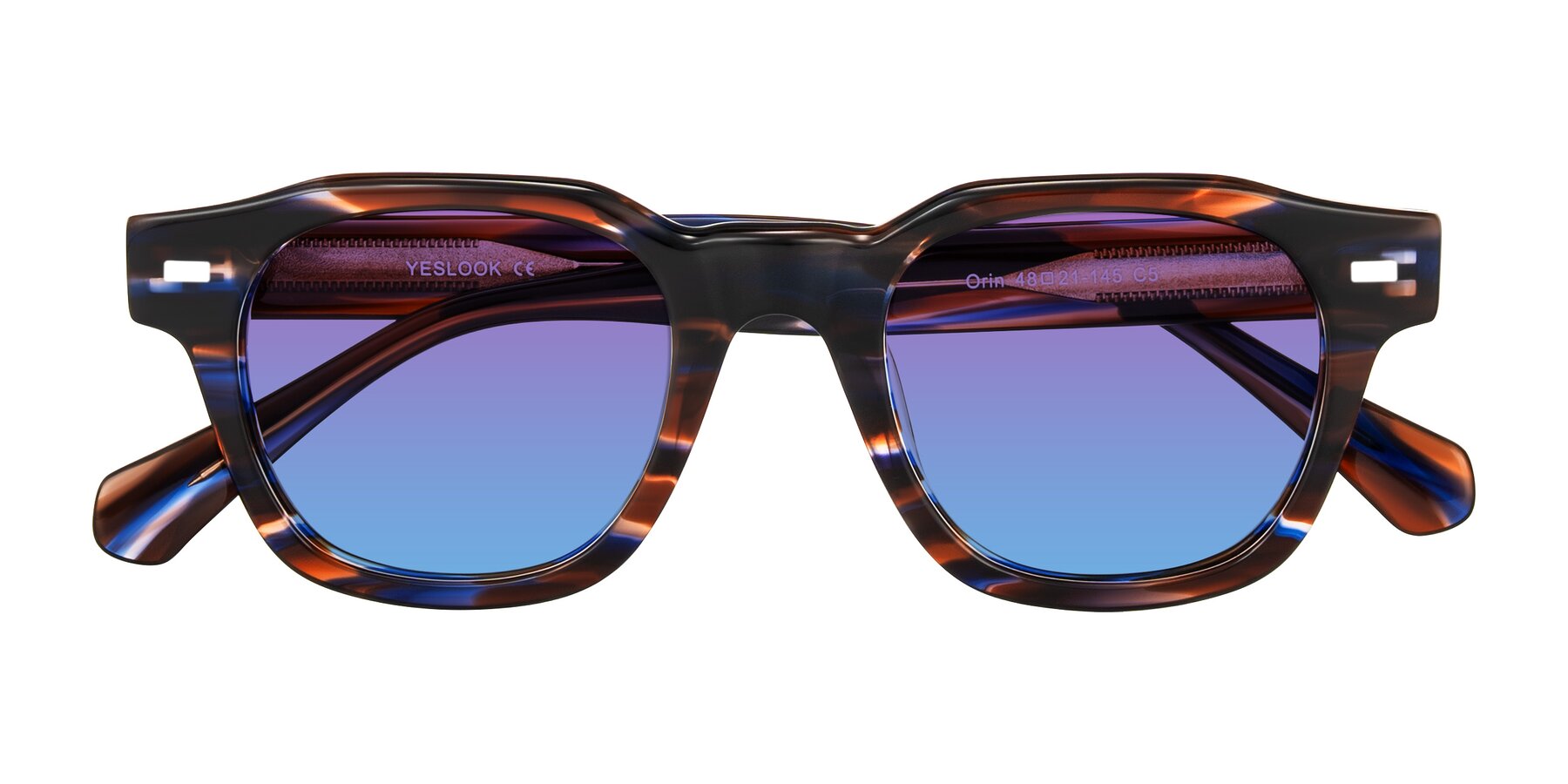 Folded Front of Orin in Brown Blue Striped with Purple / Blue Gradient Lenses