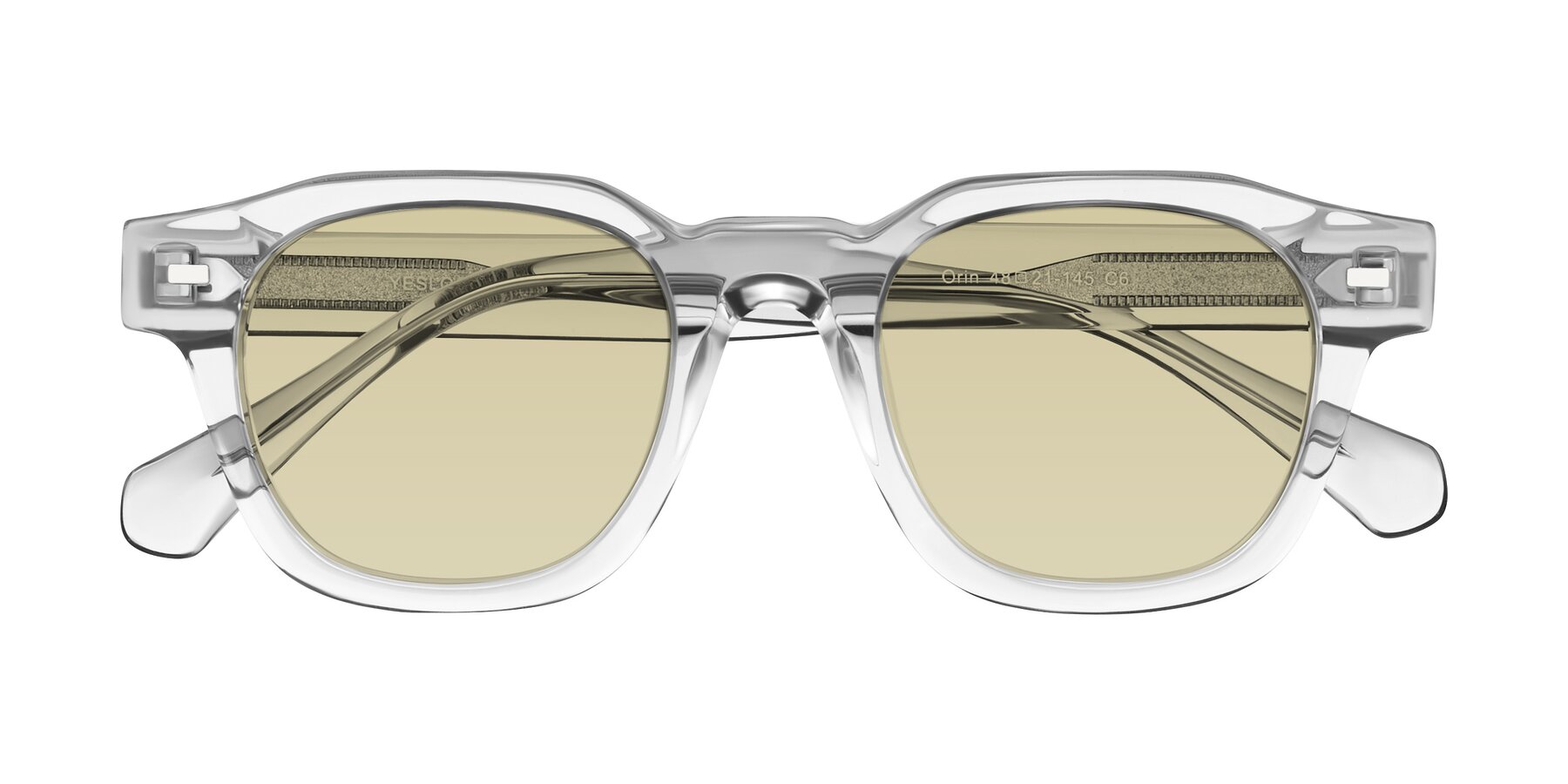 Folded Front of Orin in Transparent Gray with Light Champagne Tinted Lenses