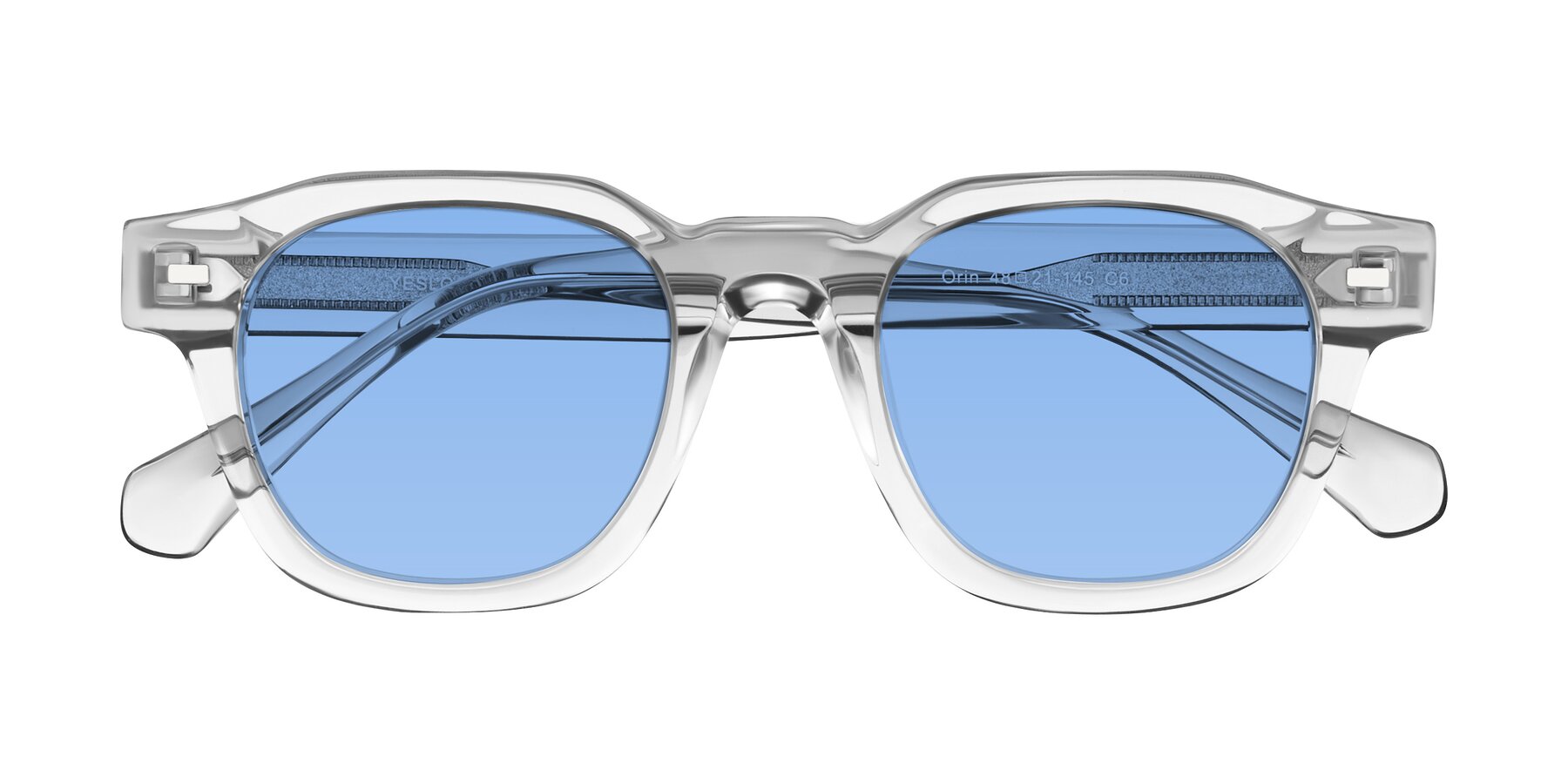 Folded Front of Orin in Transparent Gray with Medium Blue Tinted Lenses