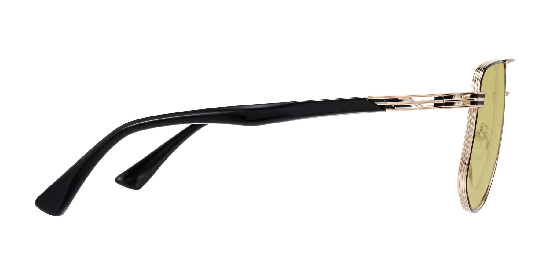 Side of Lovonin in Gold/Black with Medium Champagne Tinted Lenses