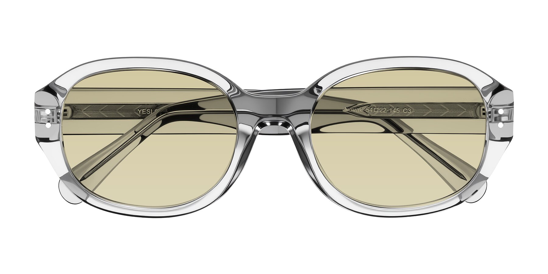 Folded Front of Novak in Transparent Gray with Light Champagne Tinted Lenses