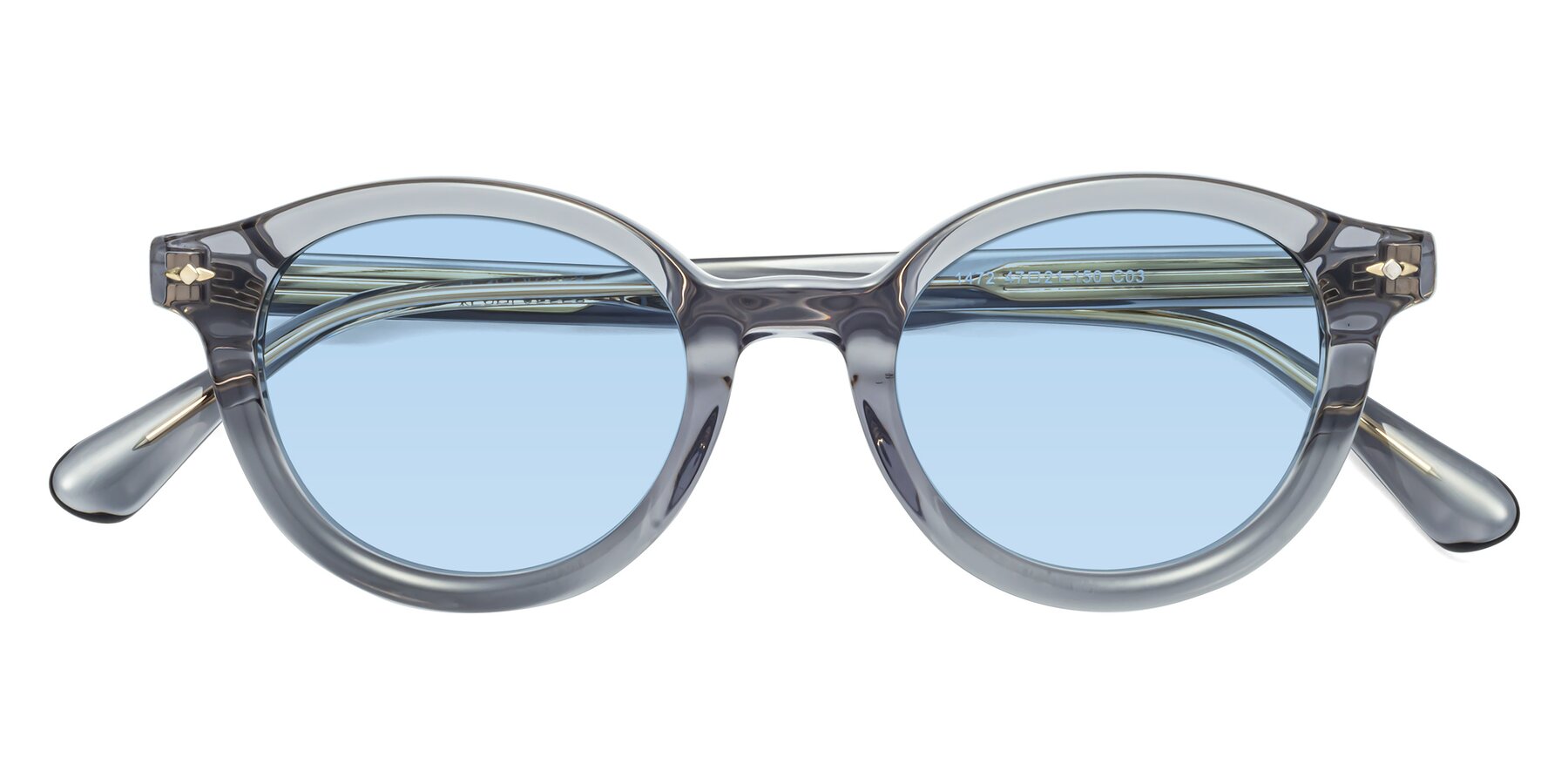 Folded Front of 1472 in Transparent Gray with Light Blue Tinted Lenses
