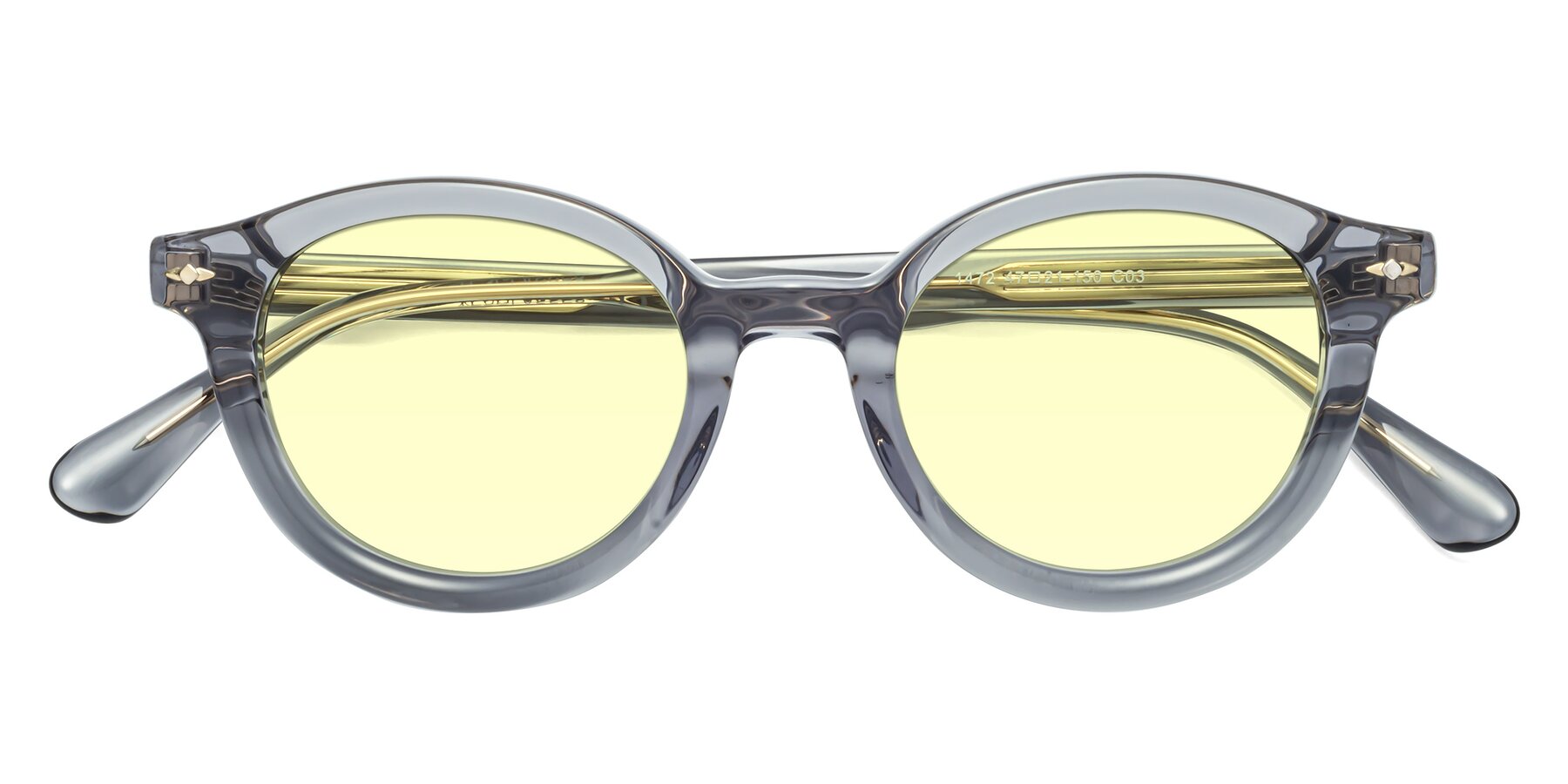 Folded Front of 1472 in Transparent Gray with Light Yellow Tinted Lenses