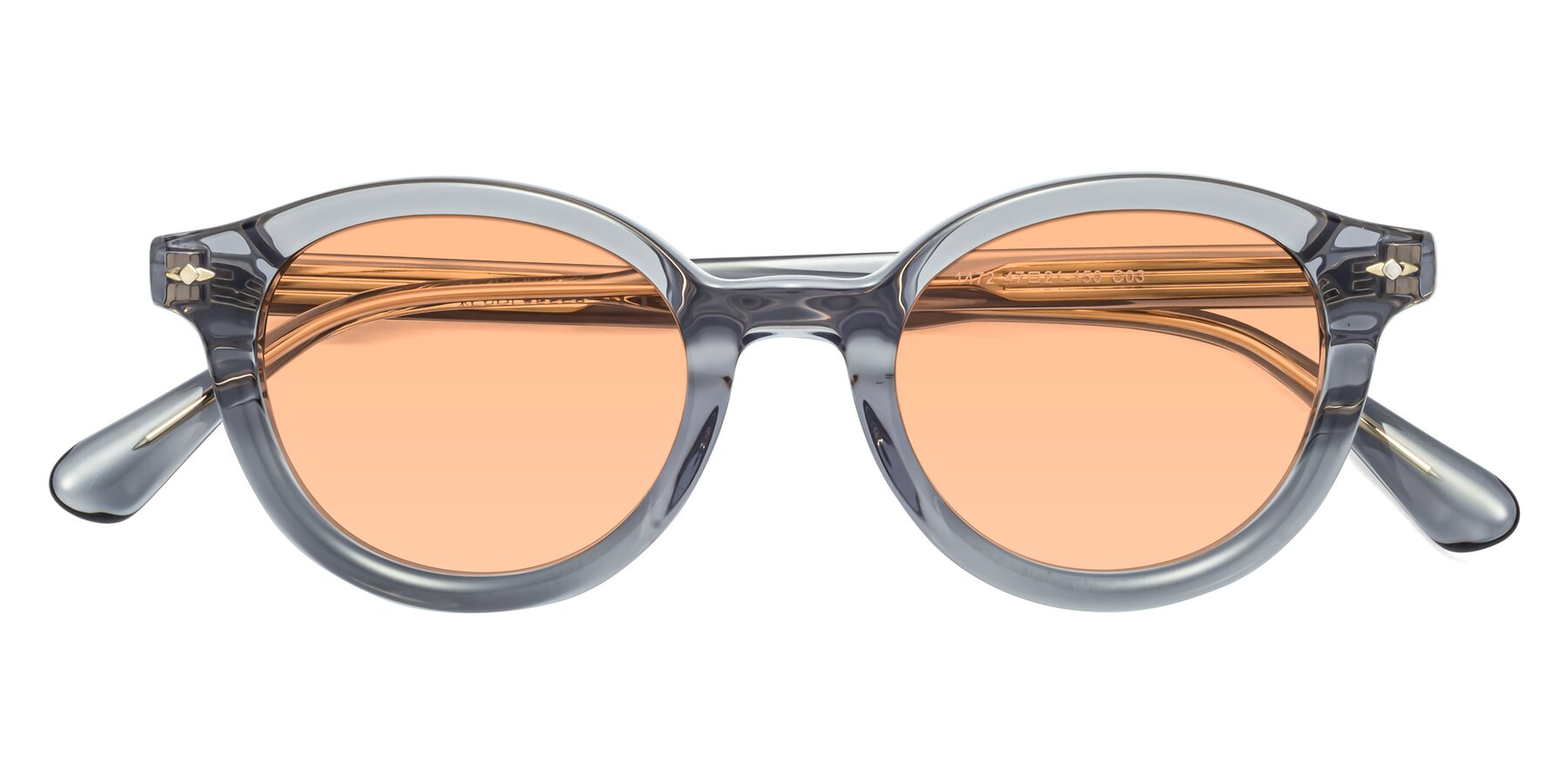Folded Front of 1472 in Transparent Gray with Light Orange Tinted Lenses