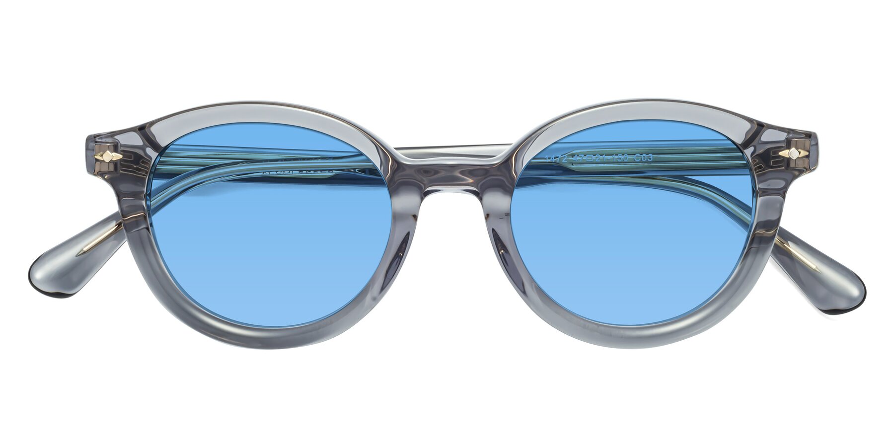 Folded Front of 1472 in Transparent Gray with Medium Blue Tinted Lenses