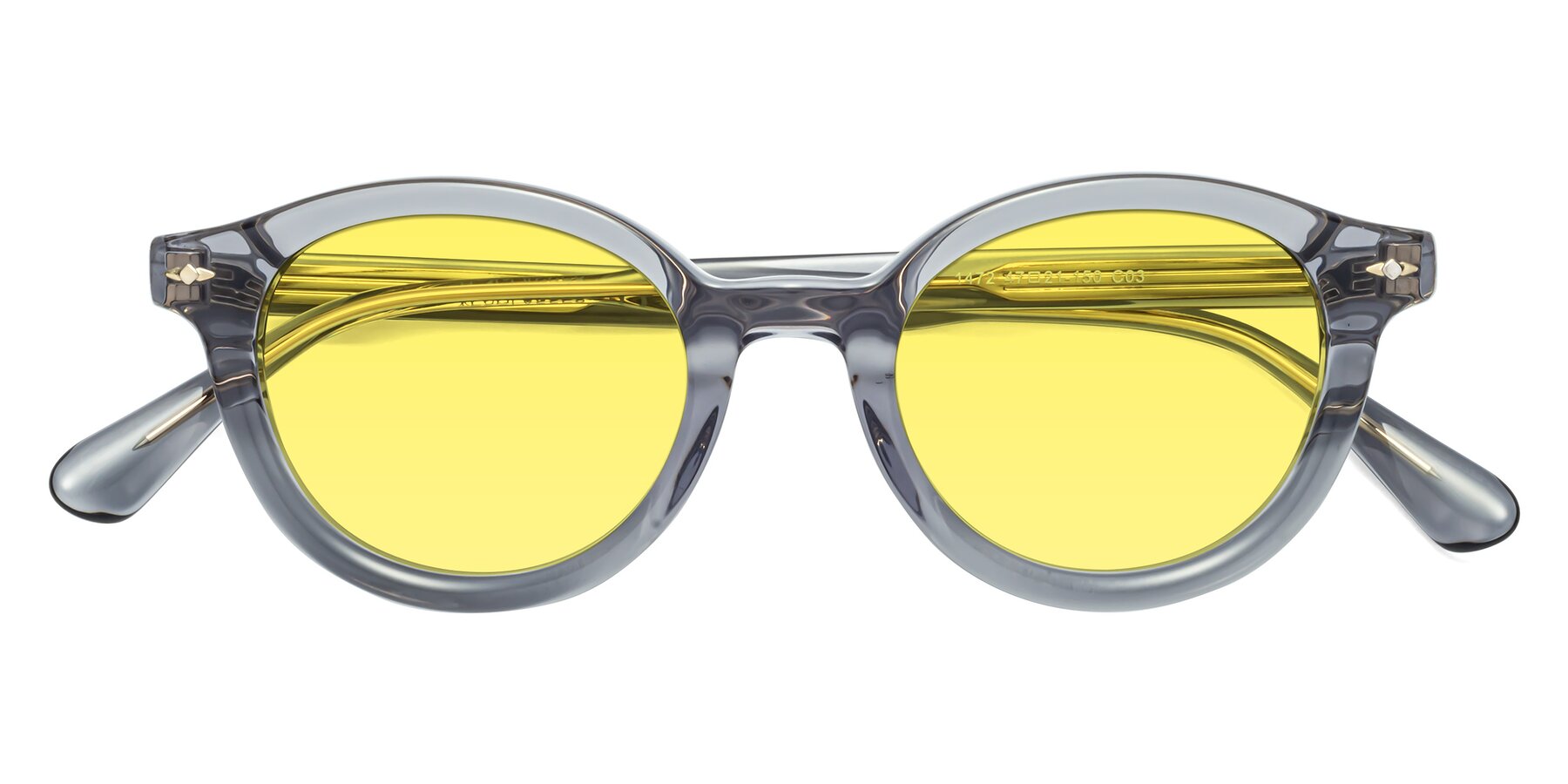 Folded Front of 1472 in Transparent Gray with Medium Yellow Tinted Lenses