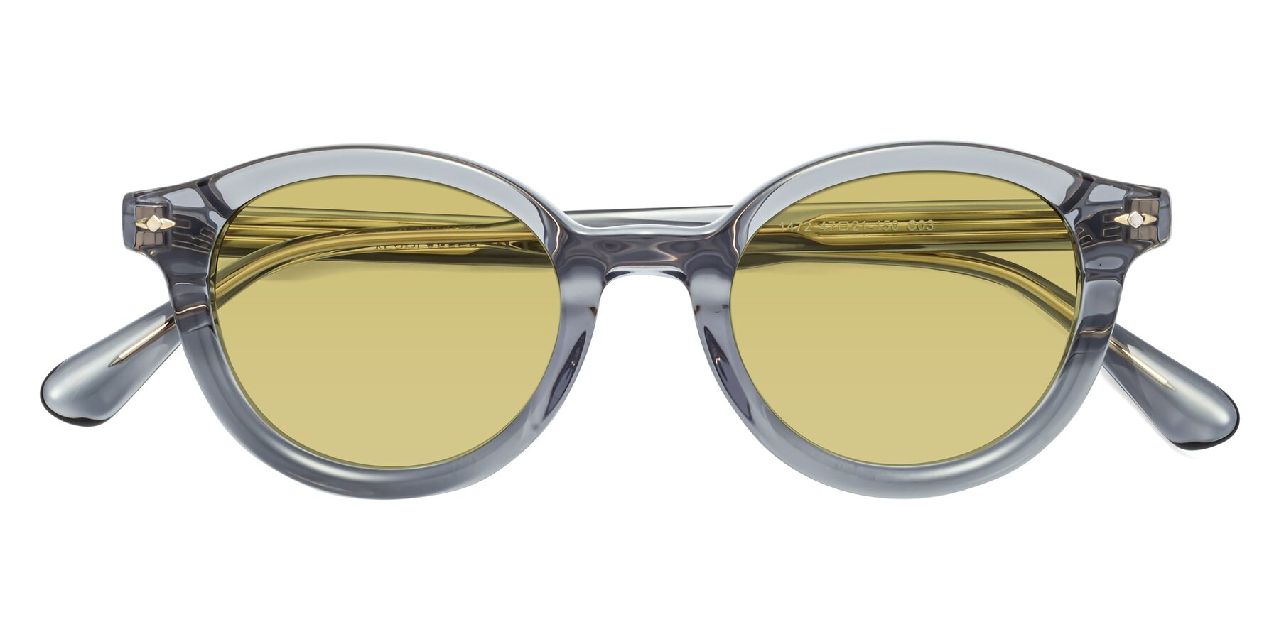Folded Front of 1472 in Transparent Gray with Medium Champagne Tinted Lenses