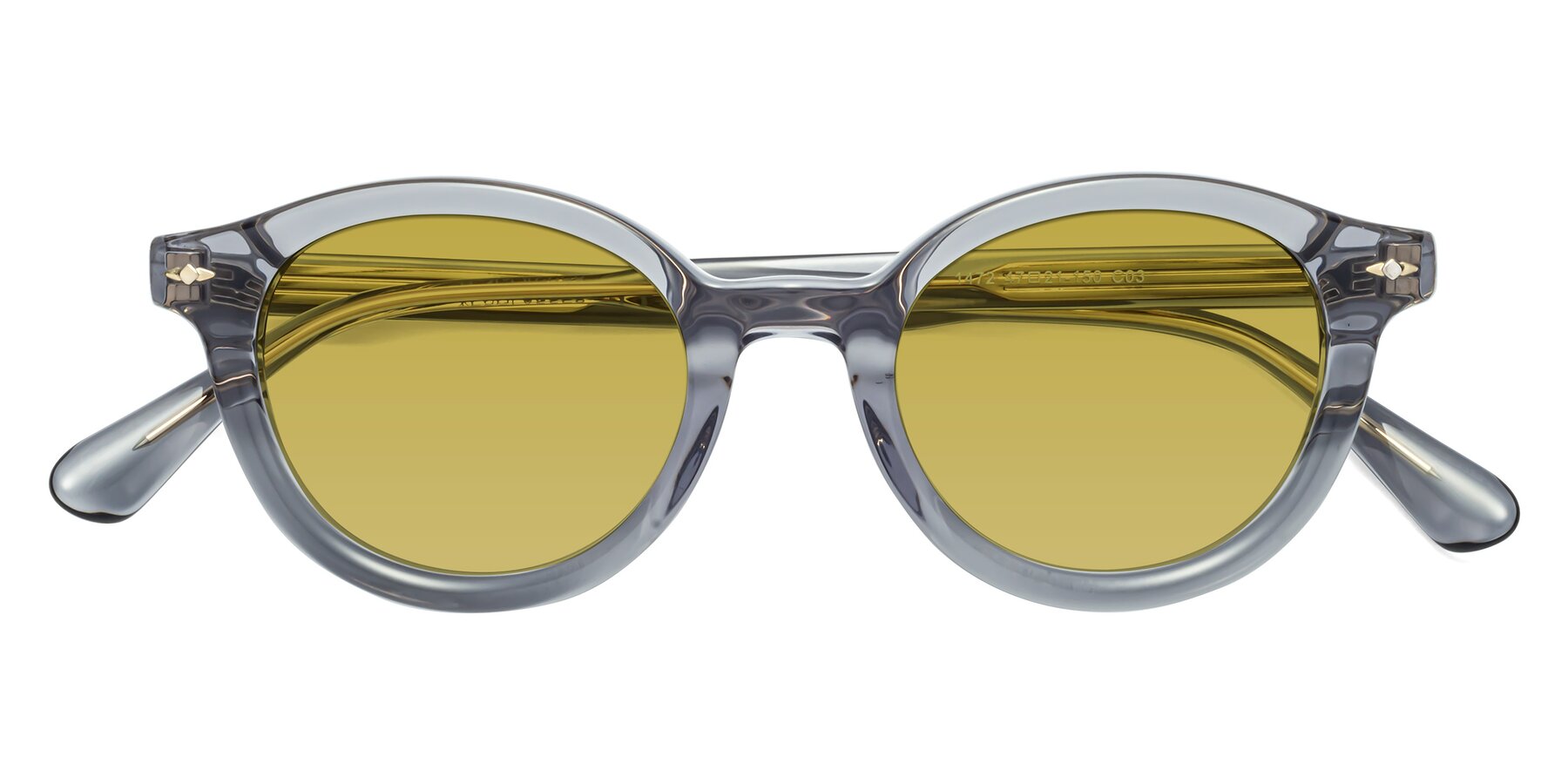 Folded Front of 1472 in Transparent Gray with Champagne Tinted Lenses