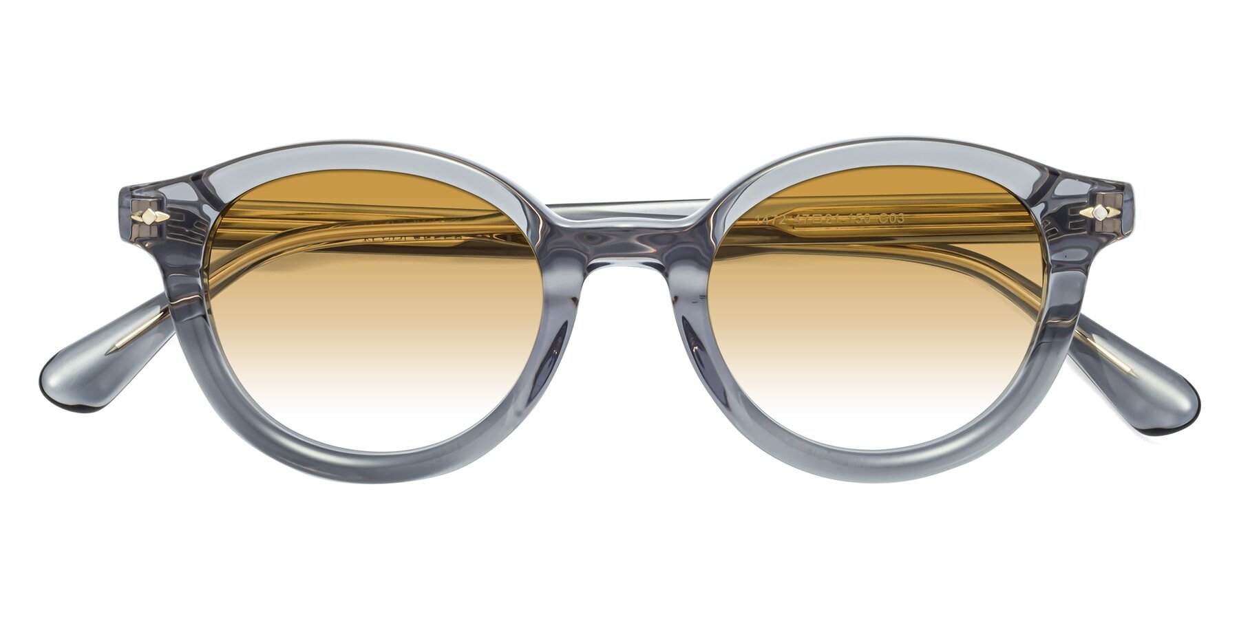 Folded Front of 1472 in Transparent Gray with Champagne Gradient Lenses