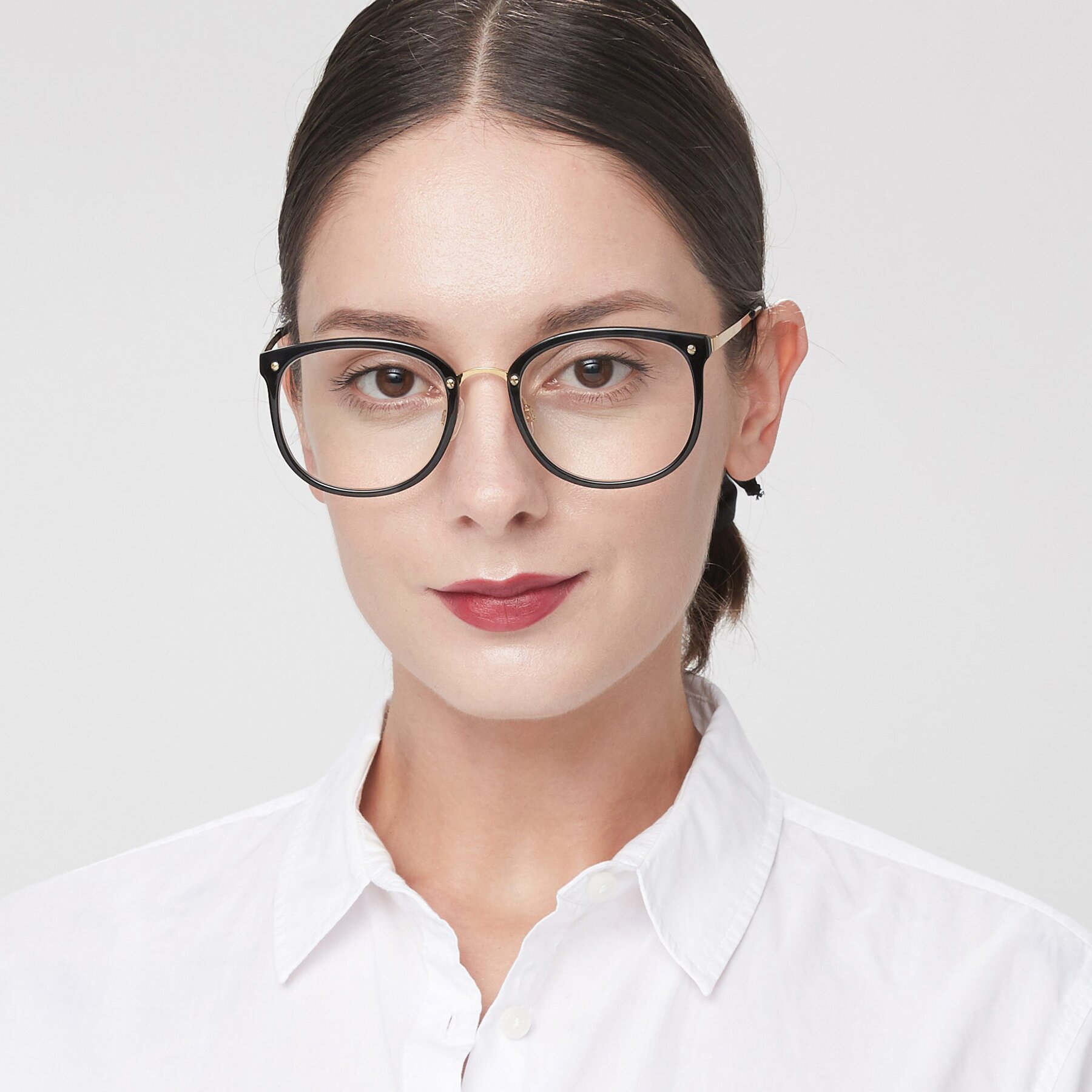 Women's lifestyle photography of Timeless in Black-Gold with Clear Eyeglass Lenses
