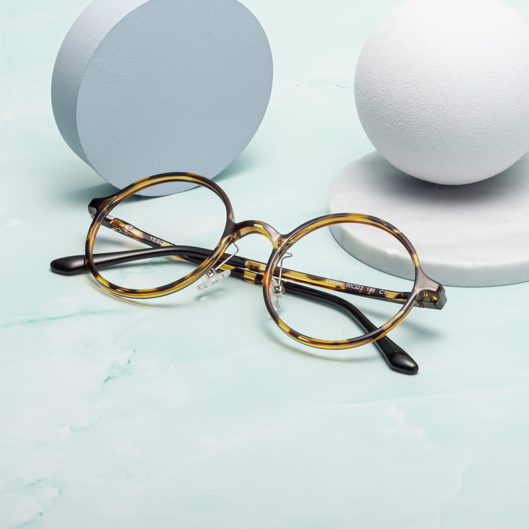 Lifestyle photography #2 of Lemon in Tortoise with Clear Reading Eyeglass Lenses