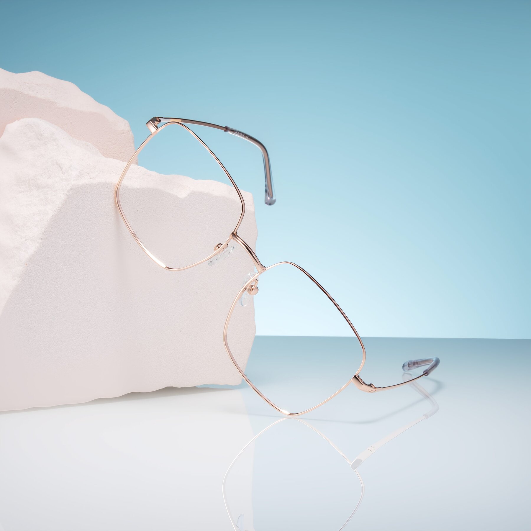 Lifestyle photography #1 of Billie in Rose Gold with Clear Blue Light Blocking Lenses