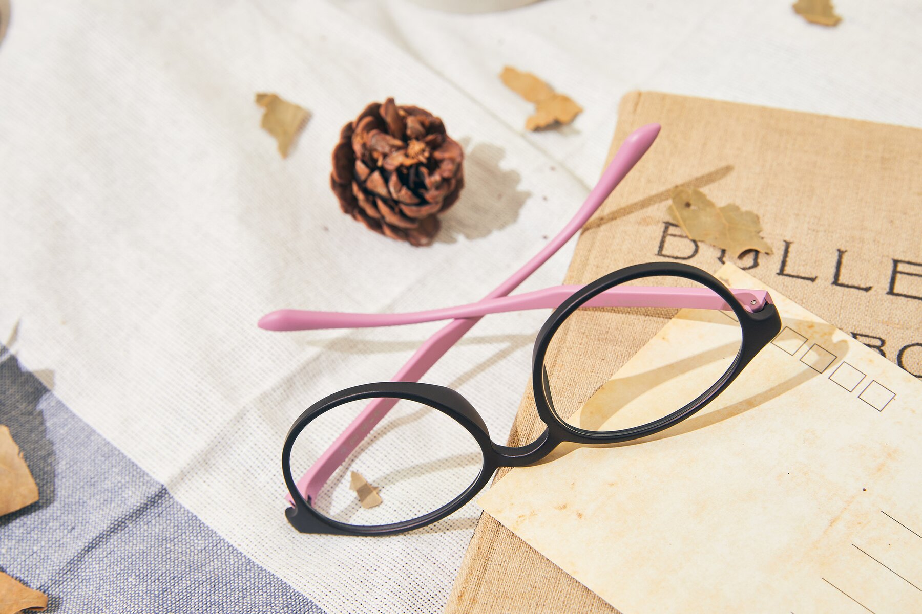 Lifestyle photography #2 of R+009N in Matte Coffee-Pink with Clear Reading Eyeglass Lenses