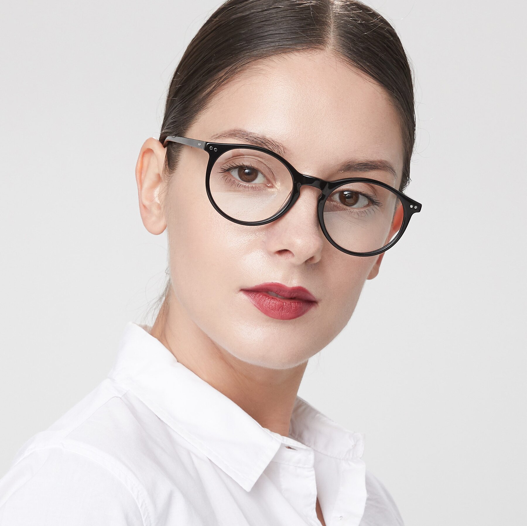 Women's lifestyle photography of Echo in Black with Clear Eyeglass Lenses