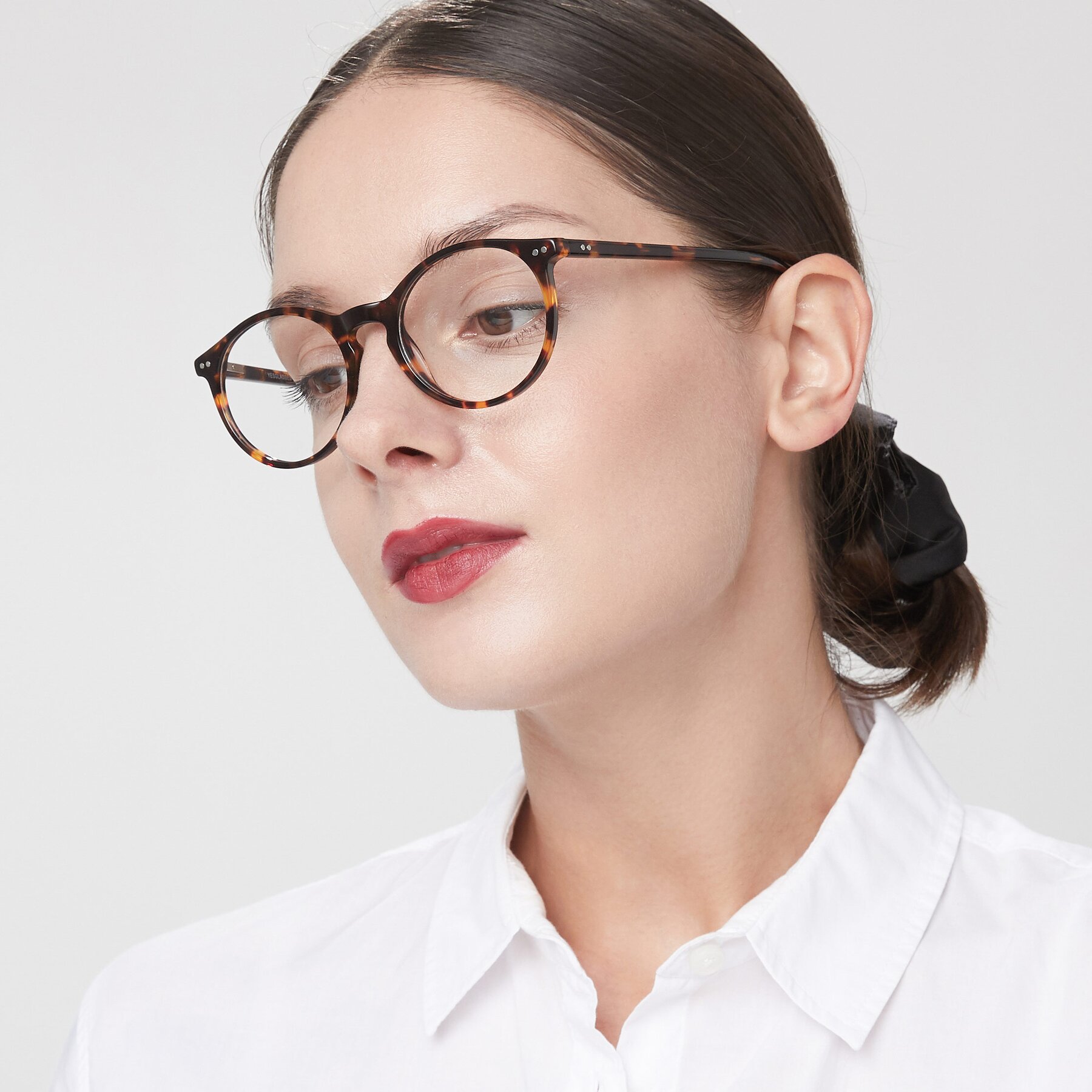 Women's lifestyle photography of Echo in Tortoise with Clear Eyeglass Lenses