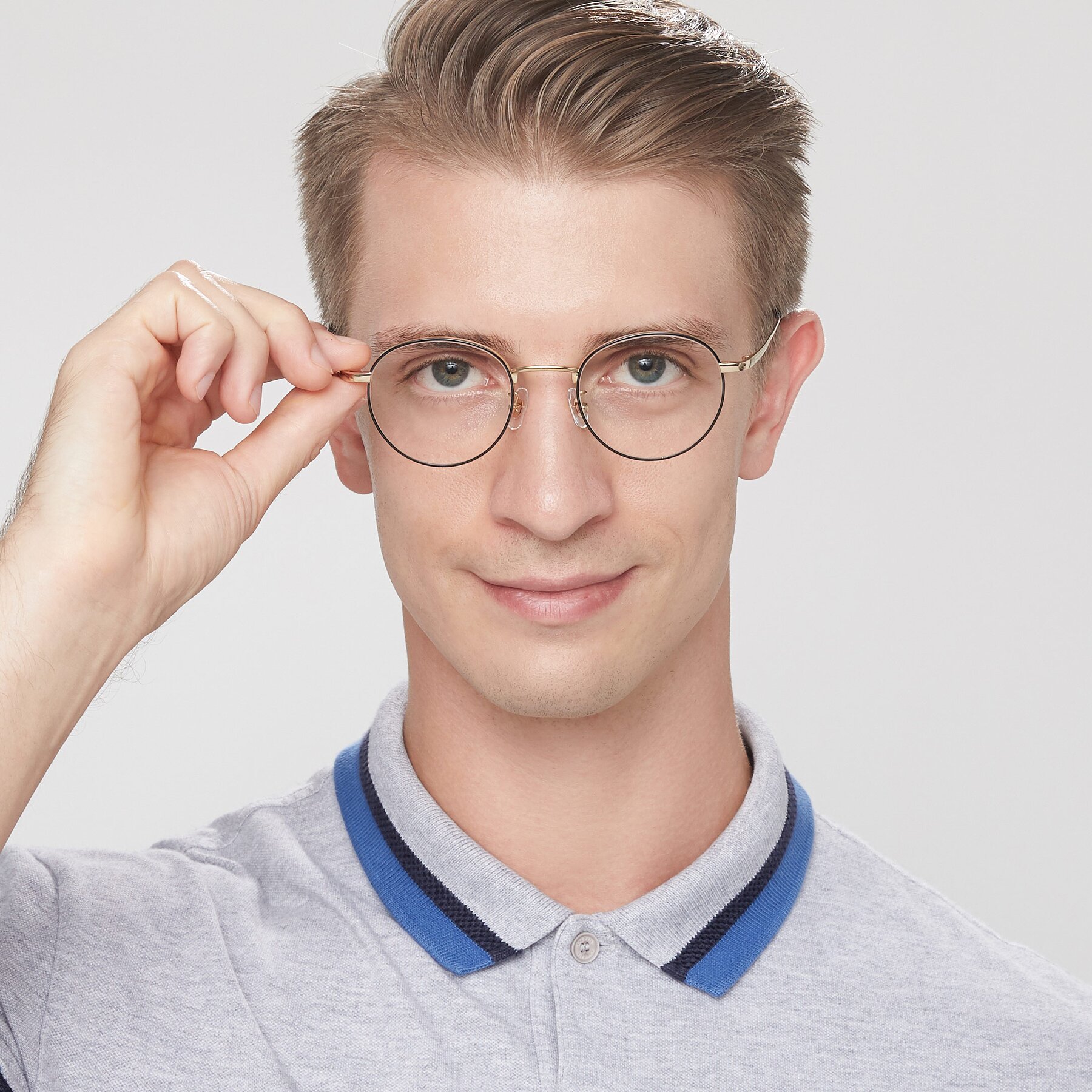 Men's lifestyle photography of Lindsey in Black-Gold with Clear Reading Eyeglass Lenses