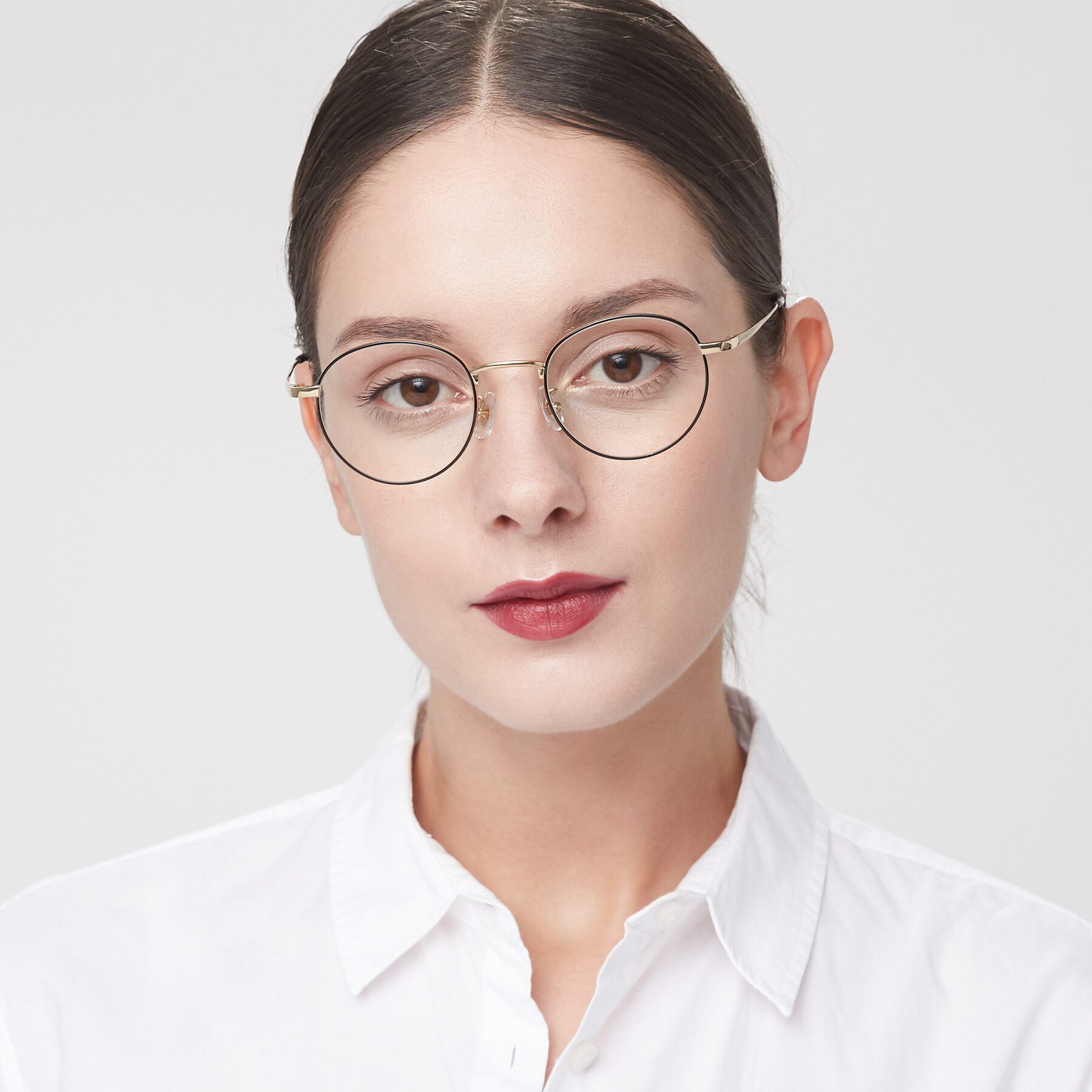 Women's lifestyle photography of Lindsey in Black-Gold with Clear Eyeglass Lenses