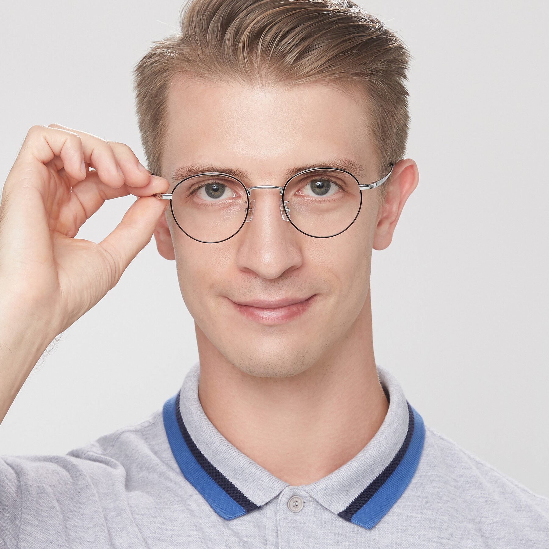 Men's lifestyle photography of Lindsey in Black-Silver with Clear Reading Eyeglass Lenses