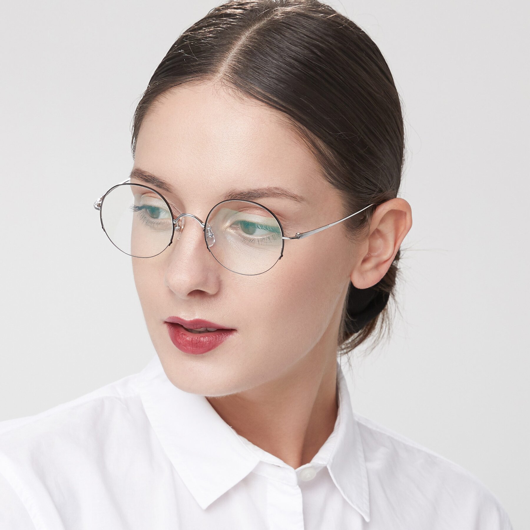 Women's lifestyle photography of Harry in Black-Silver with Clear Eyeglass Lenses