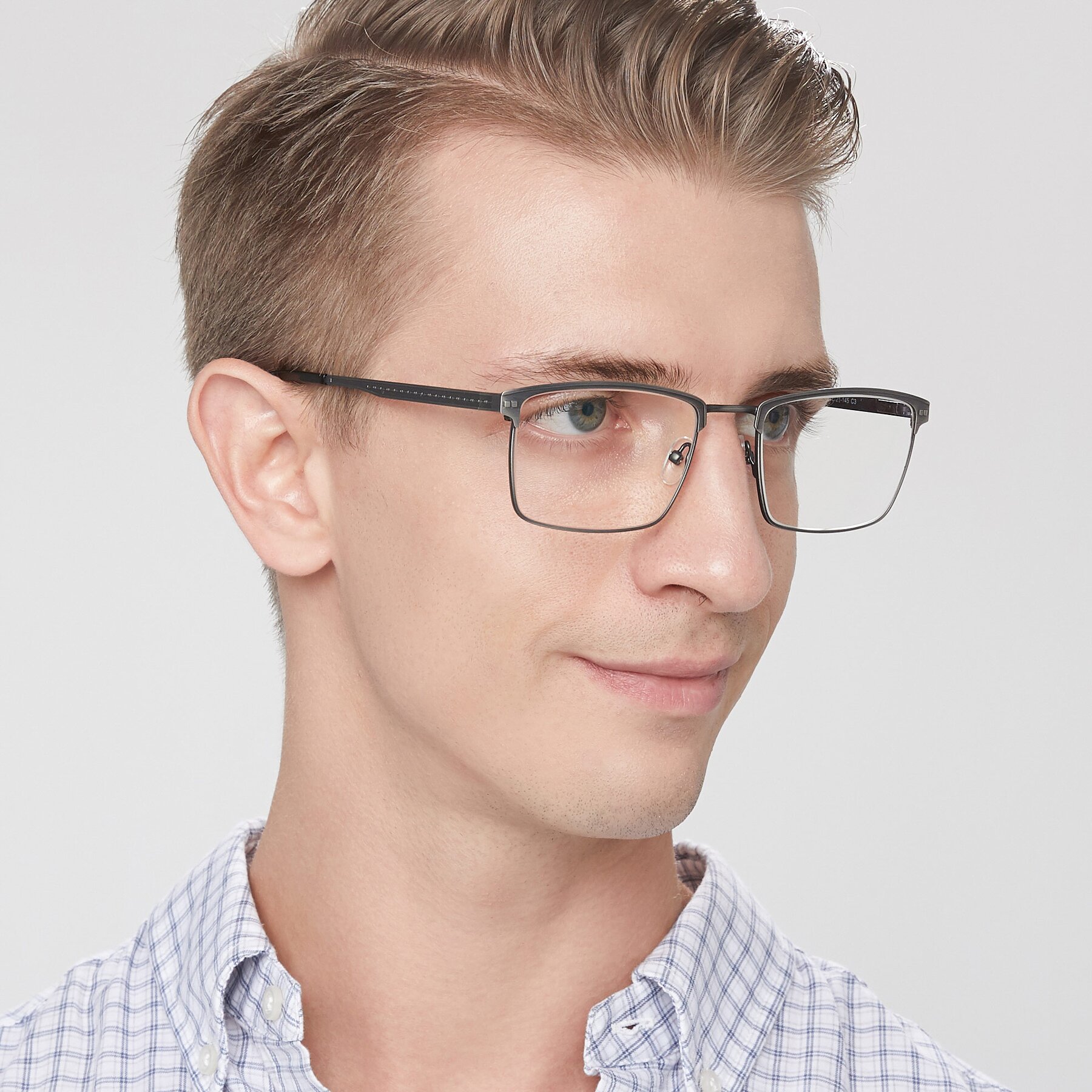 Men's lifestyle photography of 9420 in Antique Gunmetal with Clear Reading Eyeglass Lenses