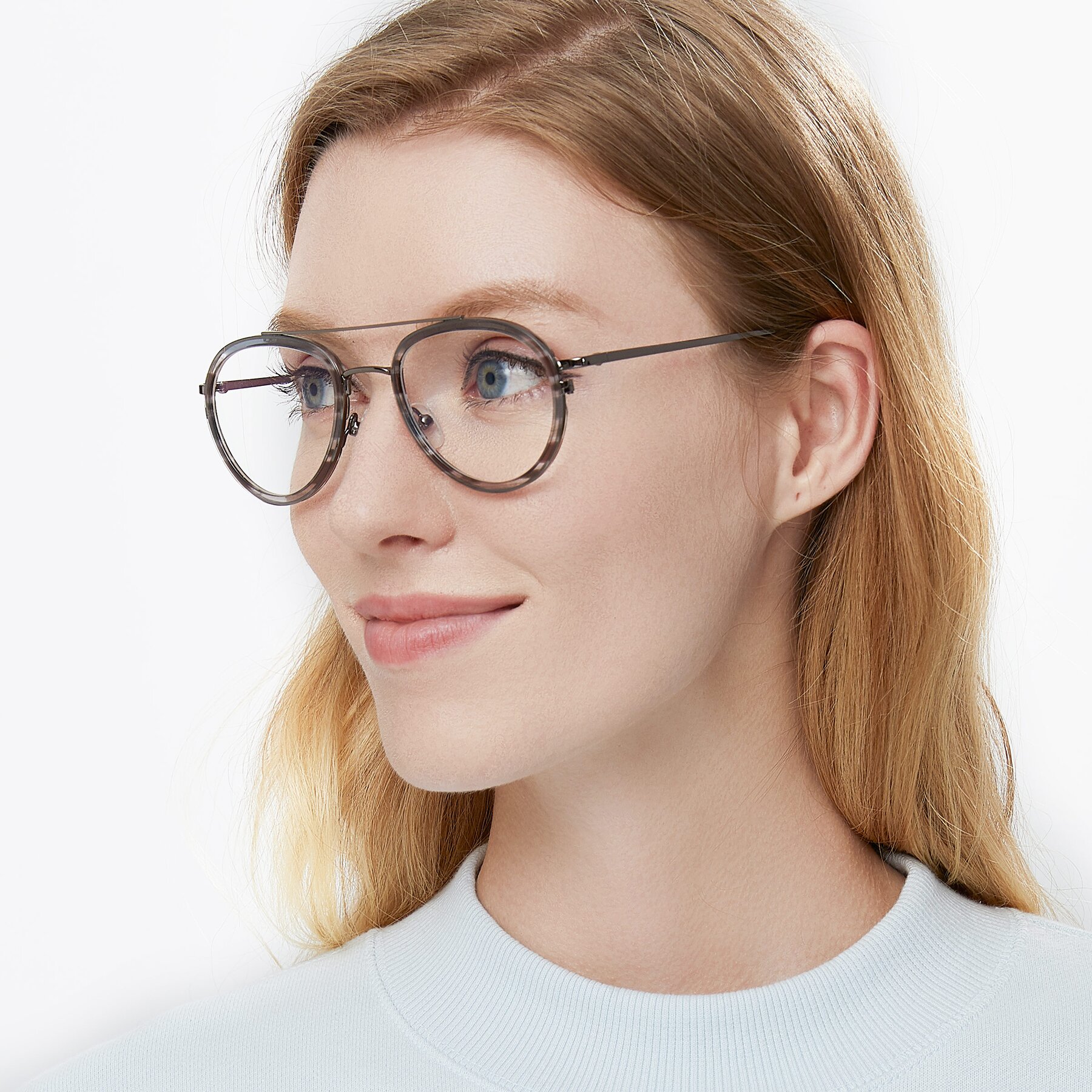 Women's lifestyle photography of 9554 in Silver-Transparent with Clear Blue Light Blocking Lenses