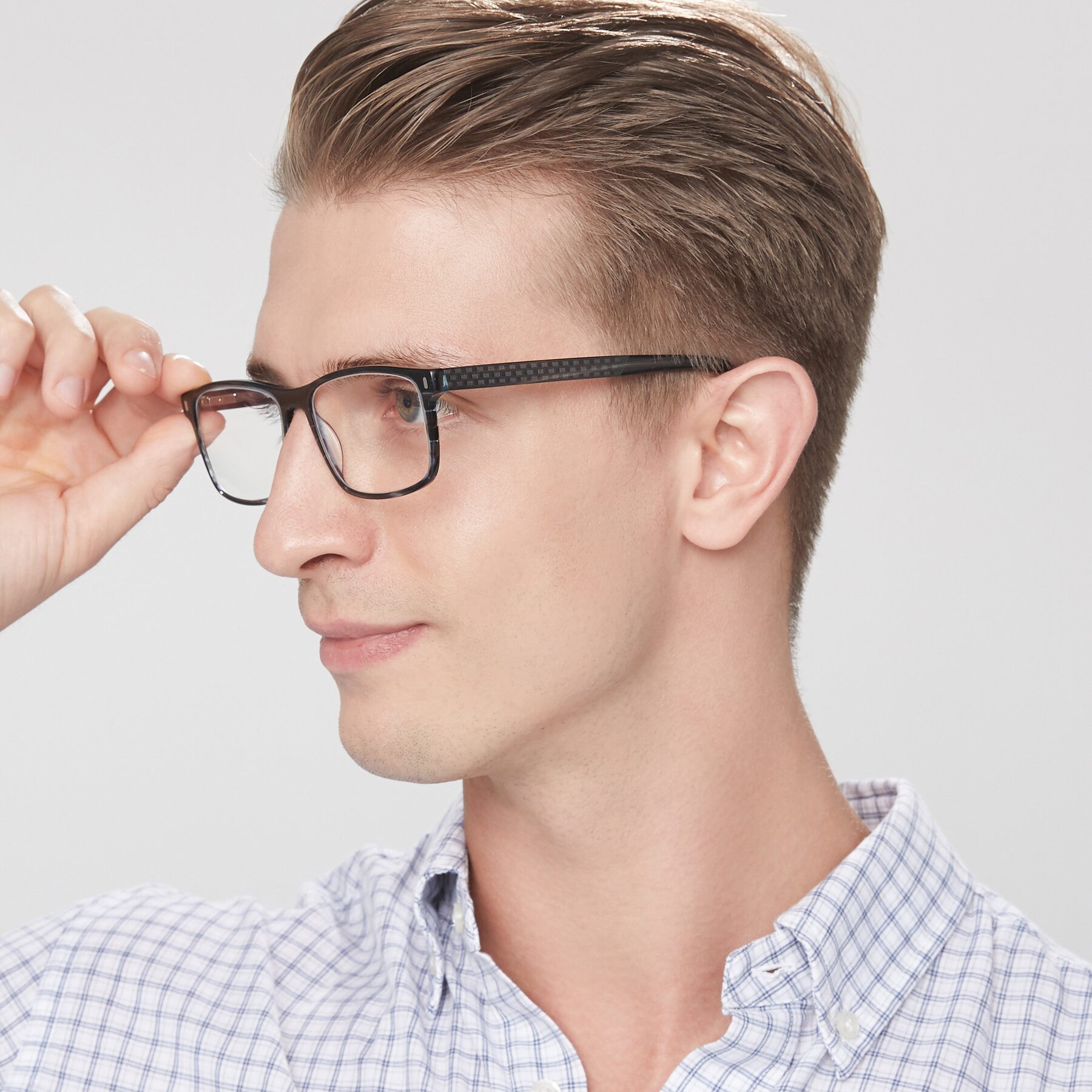 Men's lifestyle photography of 17474 in Stripe Blue with Clear Eyeglass Lenses