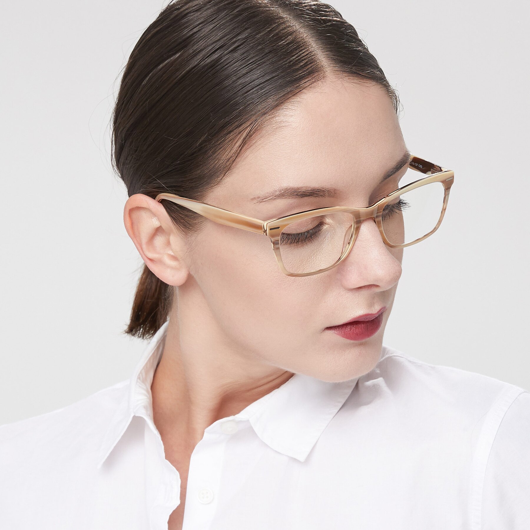 Women's lifestyle photography of 17480 in Stripe Brown with Clear Eyeglass Lenses