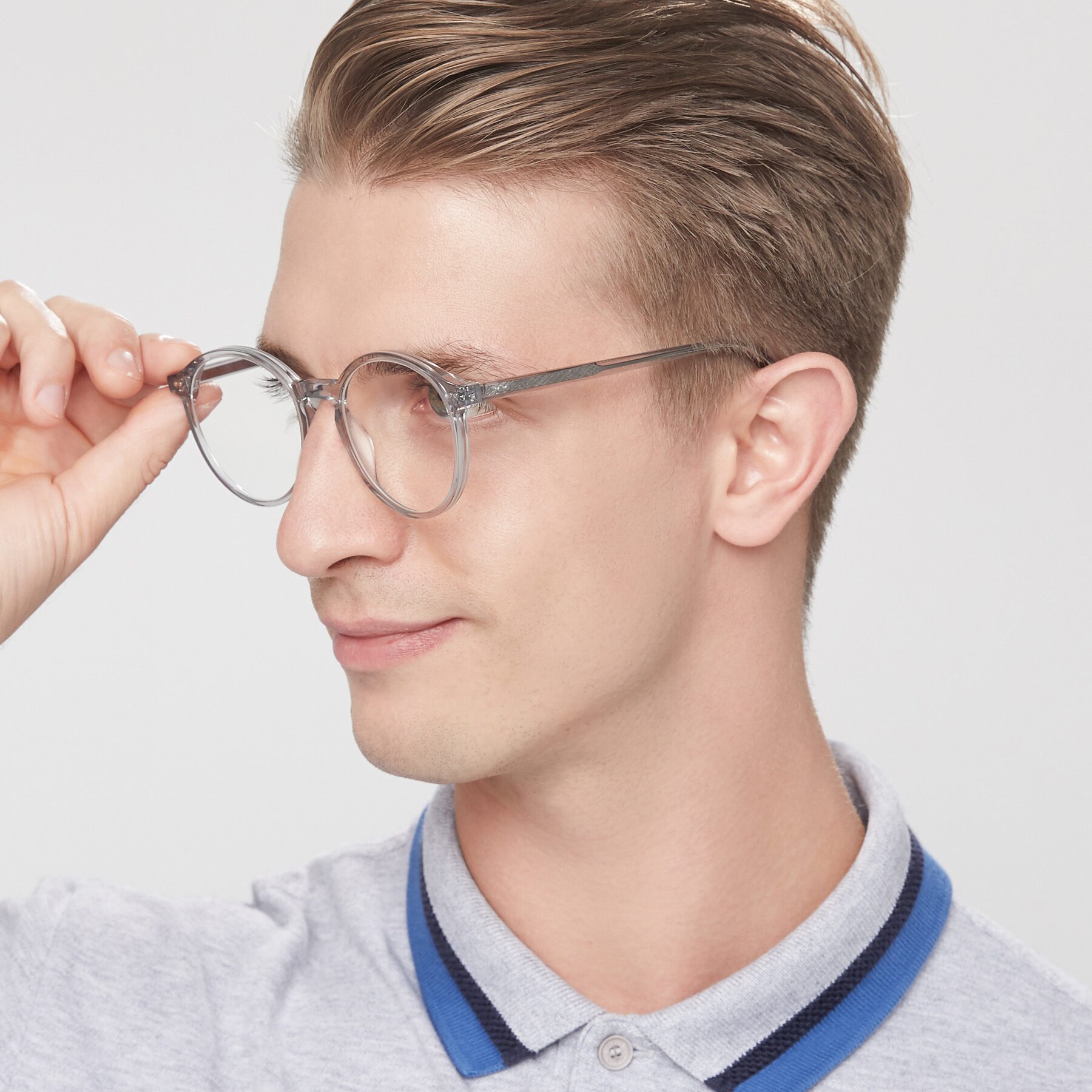 Men's lifestyle photography of 17571 in Transparent Grey with Clear Blue Light Blocking Lenses