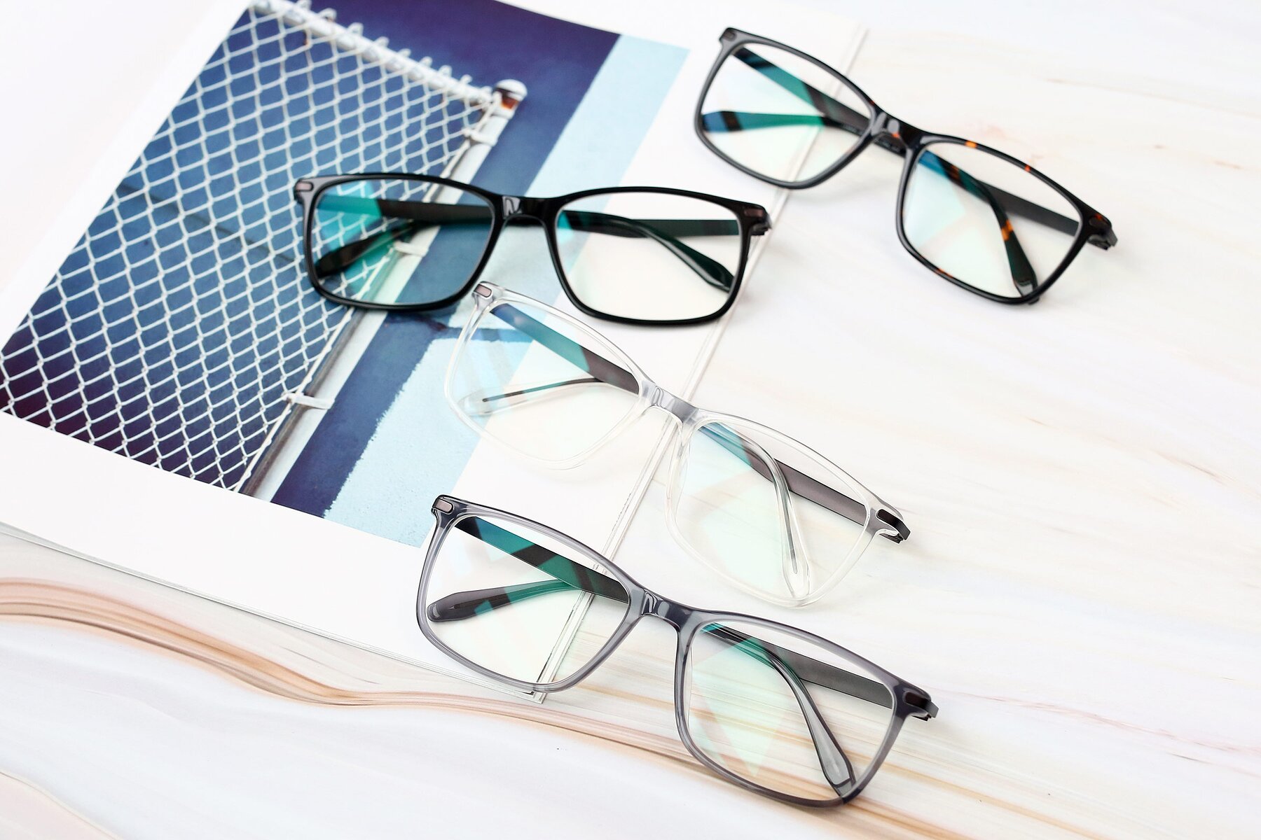 Lifestyle photography #4 of T002 in Transparent Grey with Clear Blue Light Blocking Lenses