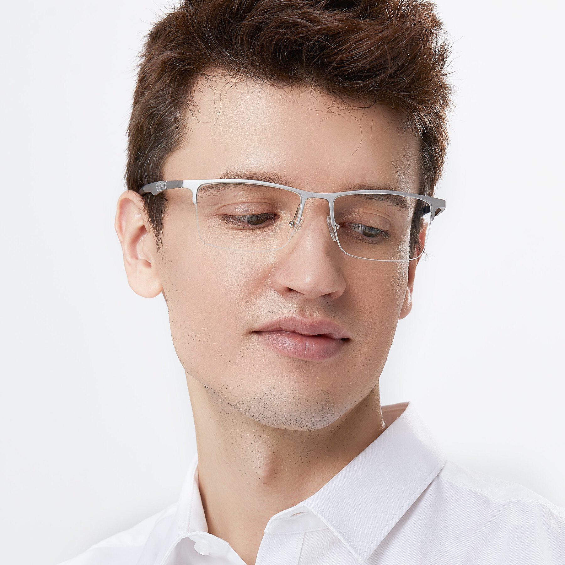 Men's lifestyle photography of XL9020 in Silver with Clear Eyeglass Lenses