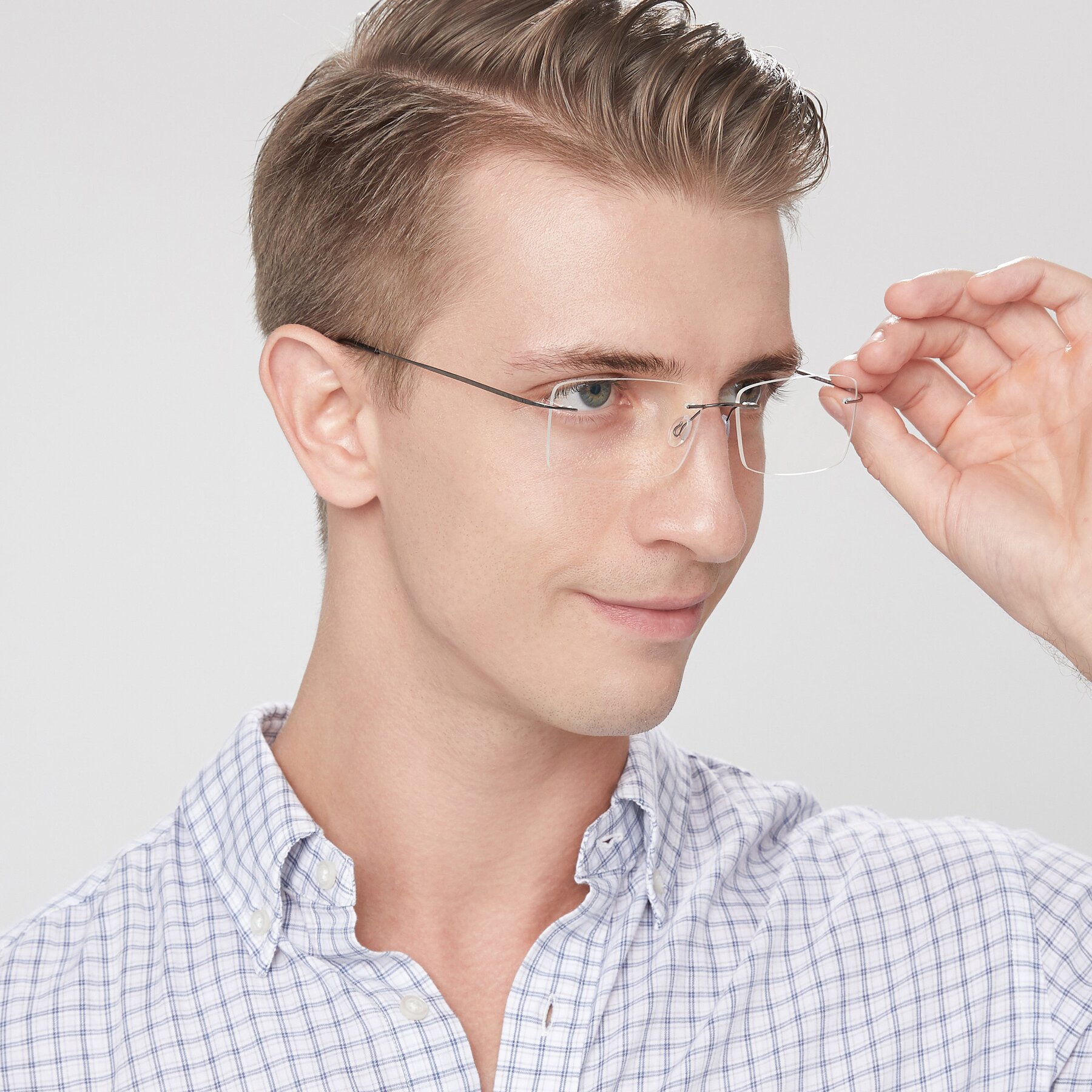 Men's lifestyle photography of Wall in Gunmetal with Clear Eyeglass Lenses