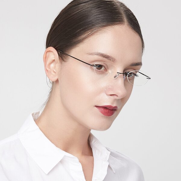 Black Flexible Oval Rimless Eyeglasses - Marv