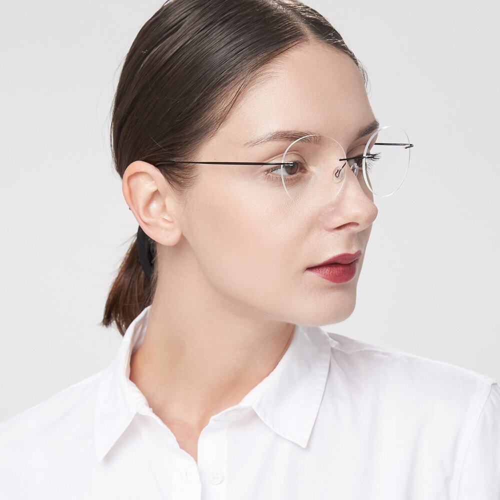 Black Flexible Round Rimless Eyeglasses - Leon