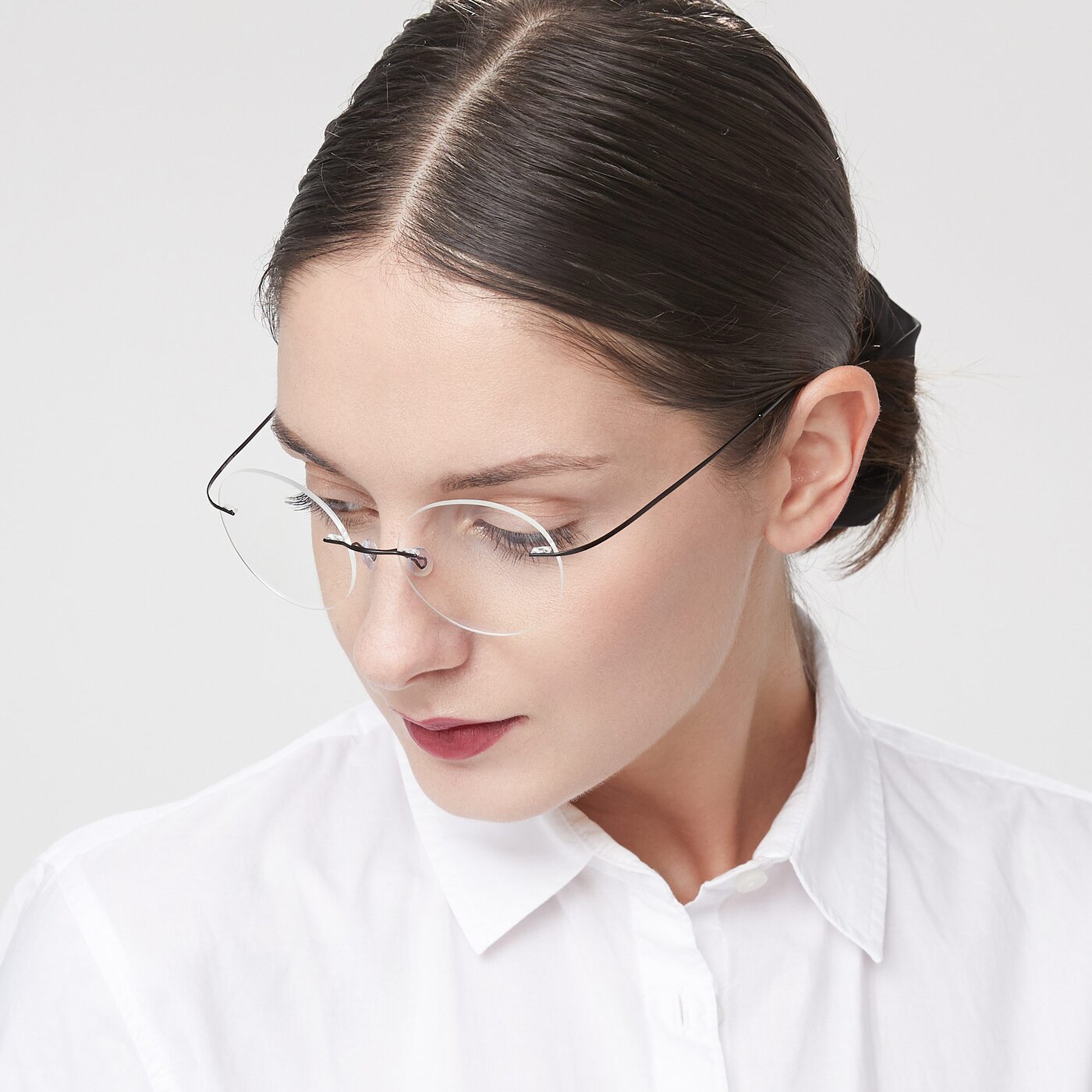 Black Flexible Round Rimless Eyeglasses - Leon