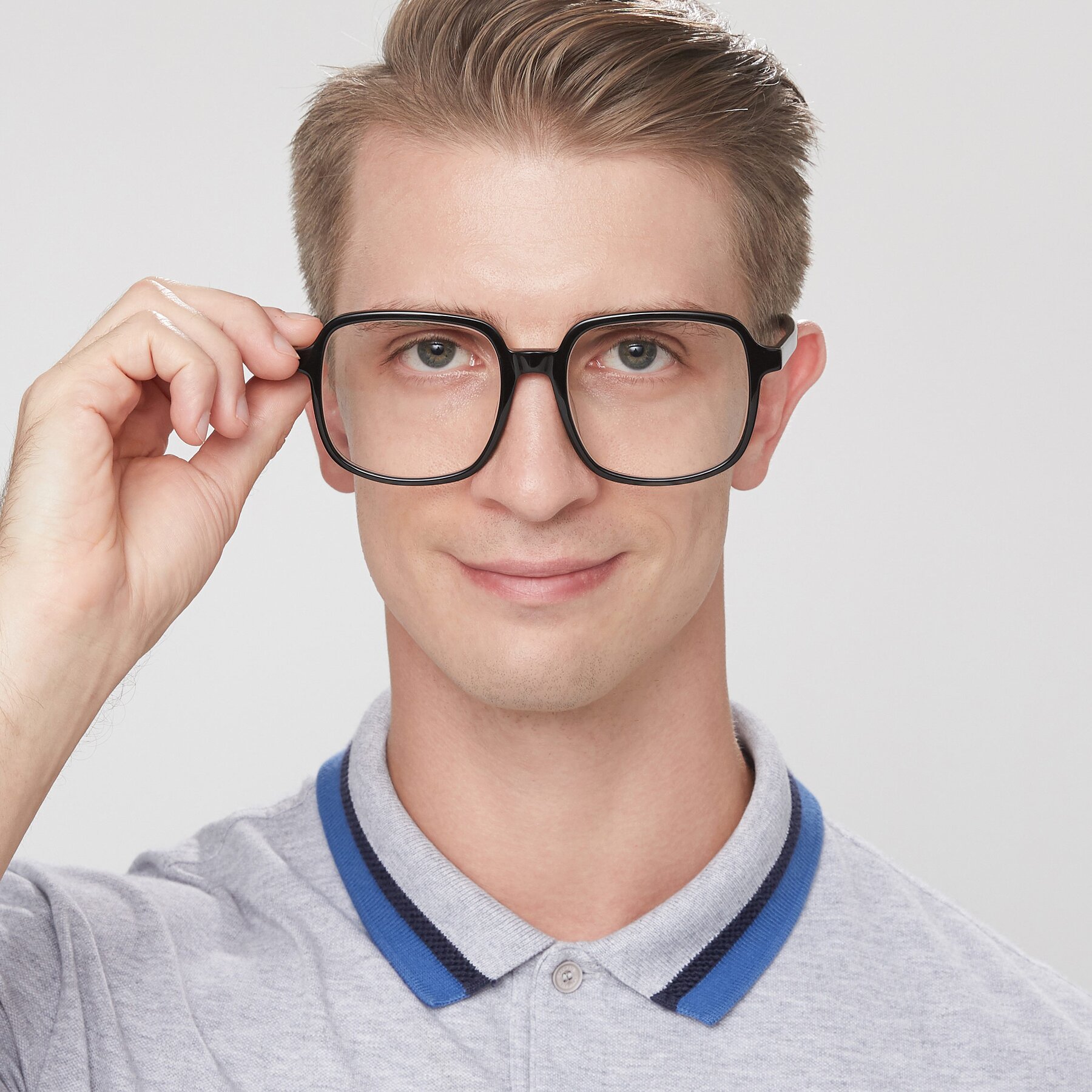Men's lifestyle photography of Water in Black with Clear Eyeglass Lenses