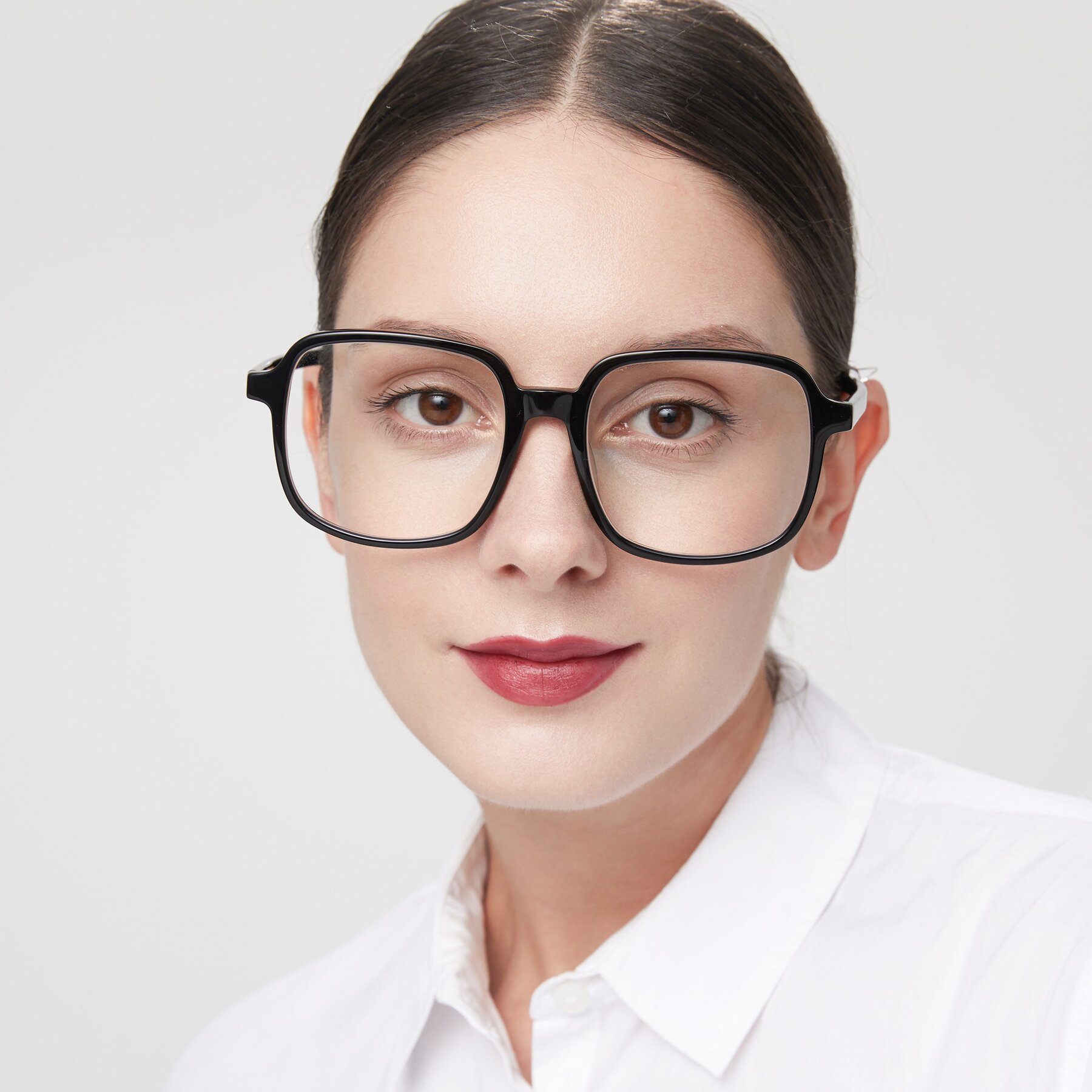 Women's lifestyle photography of Water in Black with Clear Reading Eyeglass Lenses