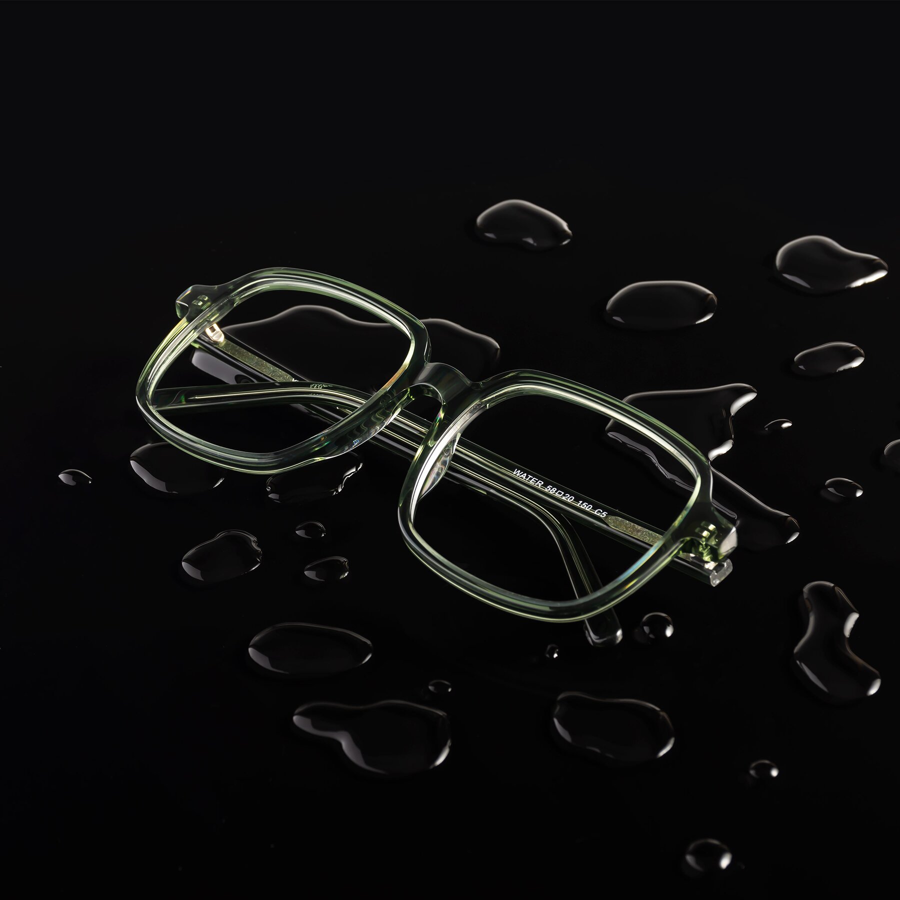 Lifestyle photography #1 of Water in Transparent Green with Clear Reading Eyeglass Lenses