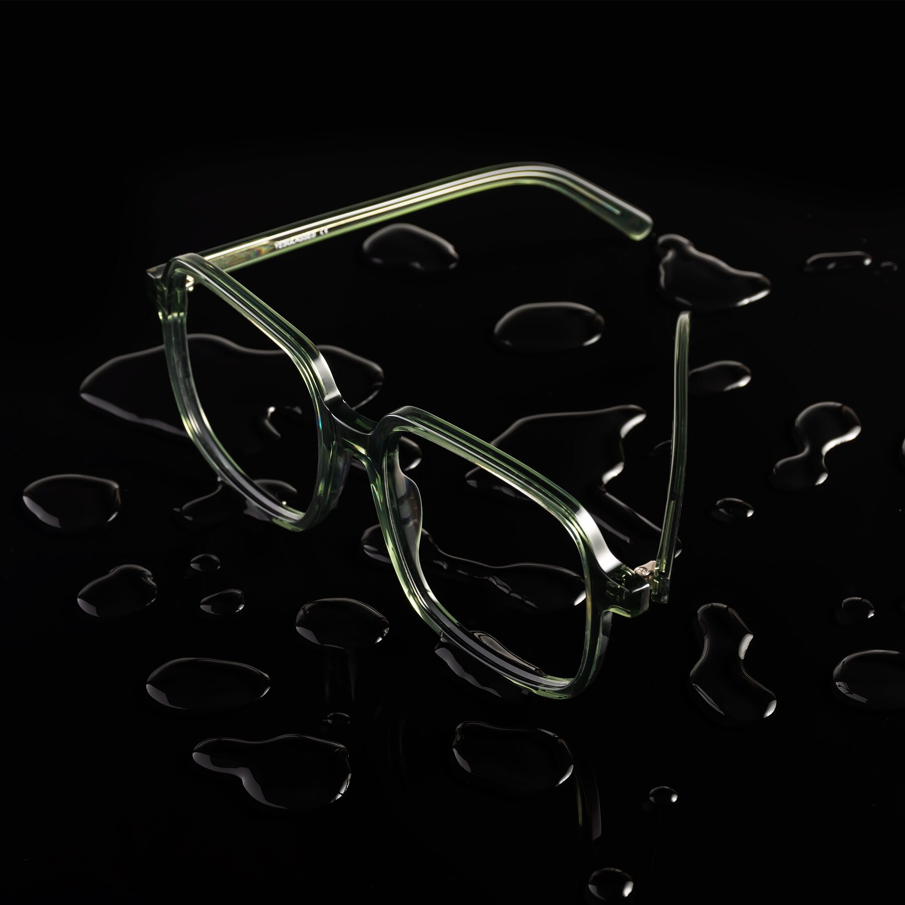 Lifestyle photography #2 of Water in Transparent Green with Clear Reading Eyeglass Lenses