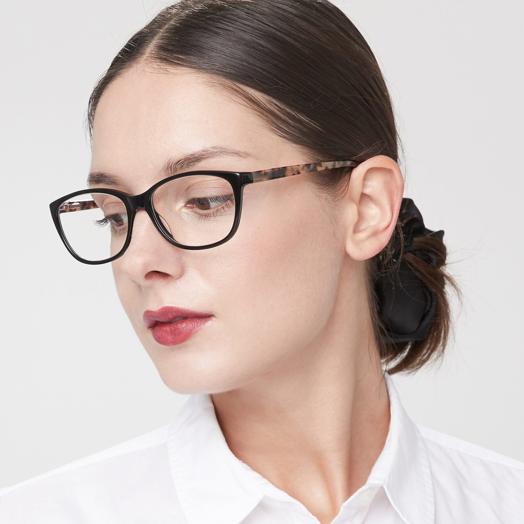 Women's lifestyle photography of Xavier in Black with Clear Reading Eyeglass Lenses