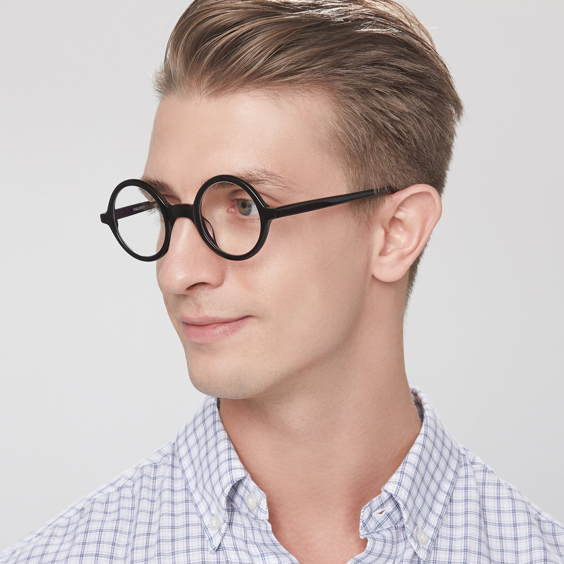 Men's lifestyle photography of Chaplin in Black with Clear Eyeglass Lenses