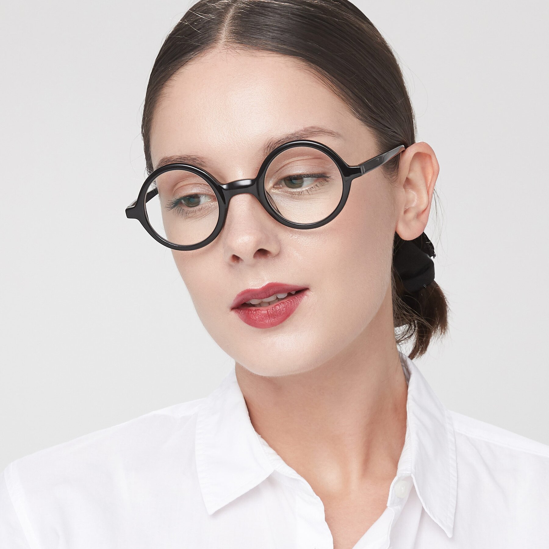 Women's lifestyle photography of Chaplin in Black with Clear Eyeglass Lenses