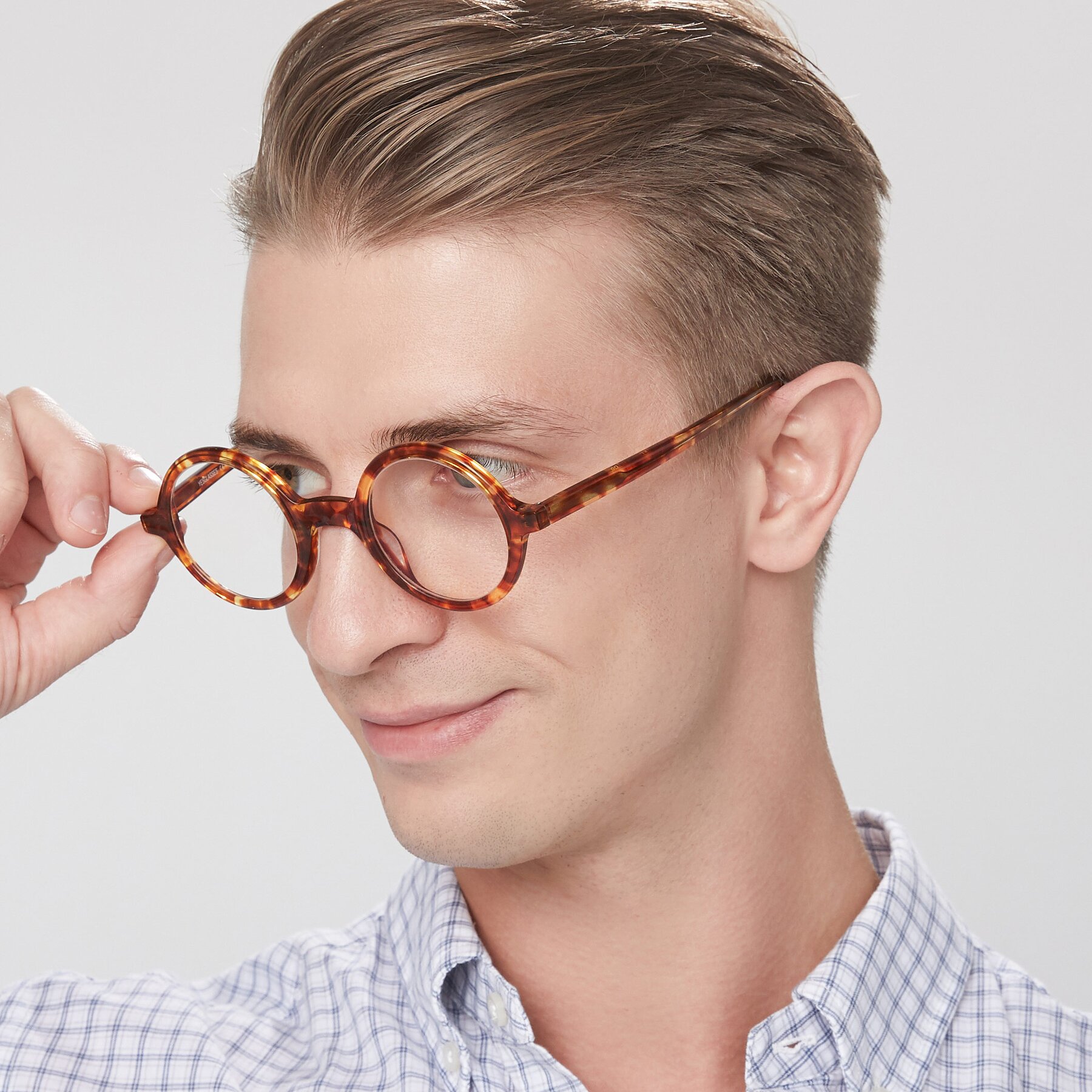 Men's lifestyle photography of Chaplin in Tortoise with Clear Reading Eyeglass Lenses