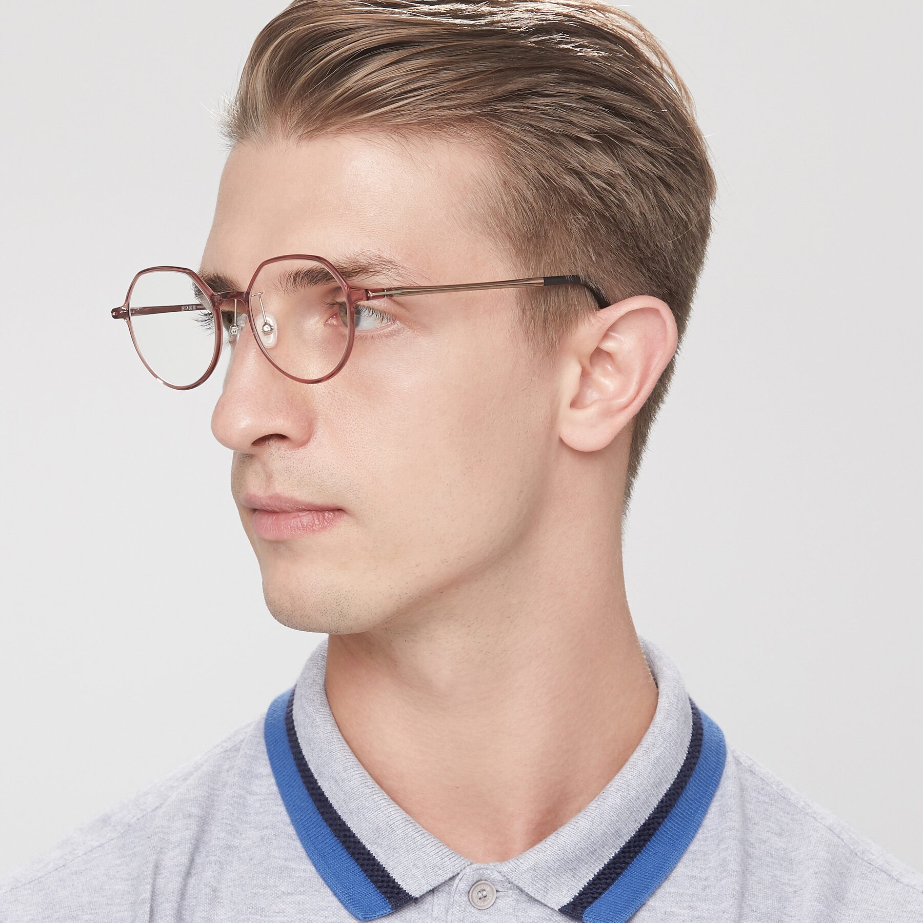 Men's lifestyle photography of IP7033 in Brown with Clear Eyeglass Lenses