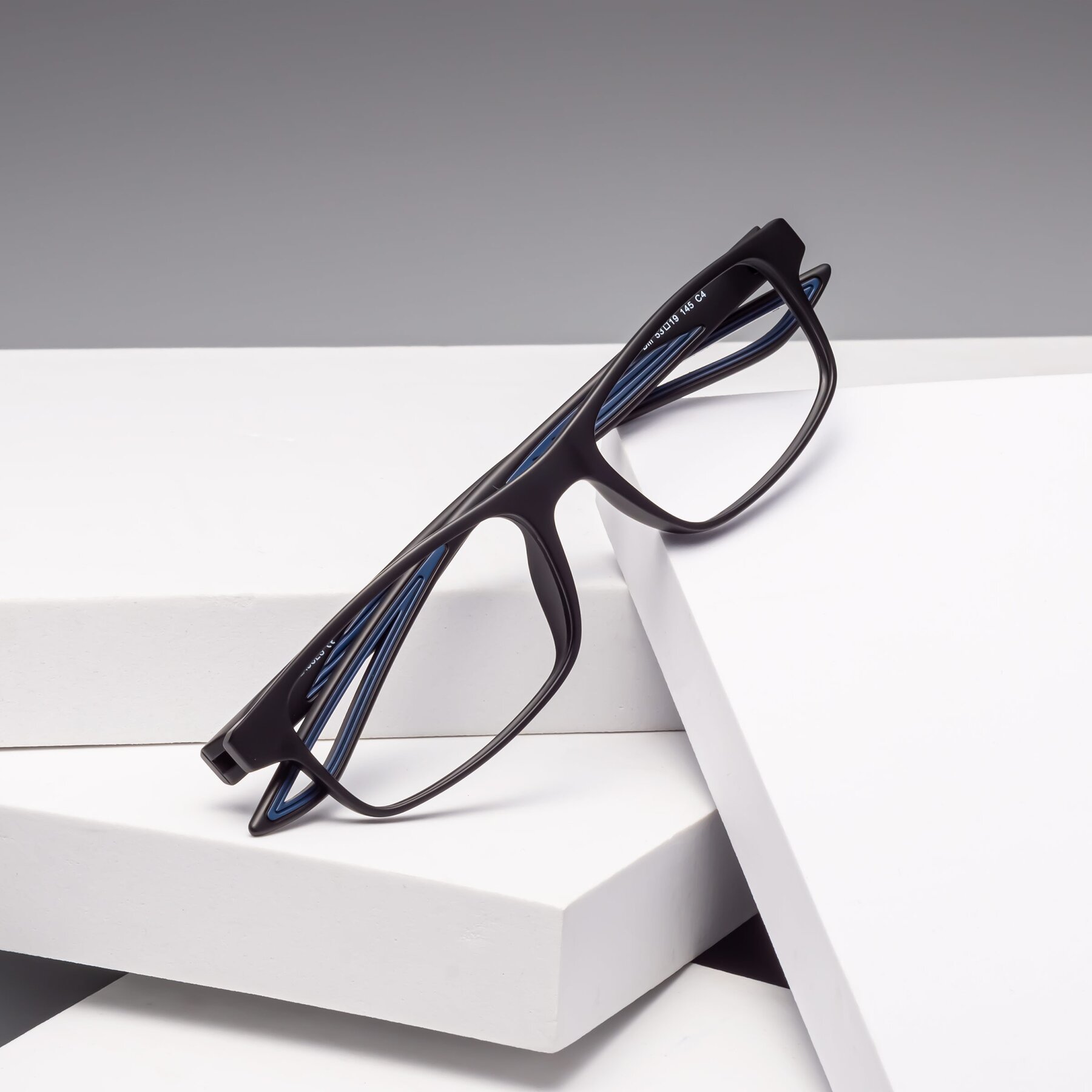 Lifestyle photography #1 of Bill in Matte Black-Blue with Clear Reading Eyeglass Lenses