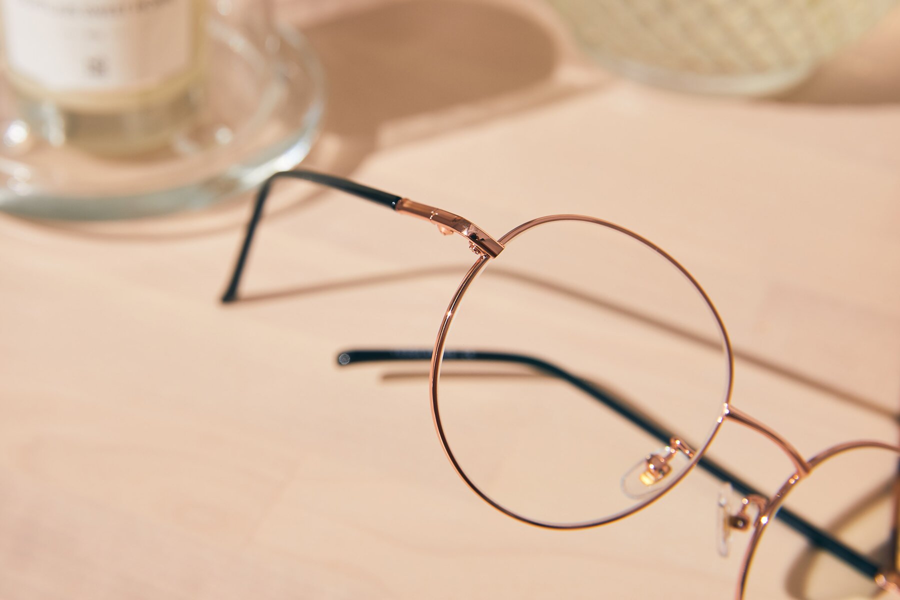 Women's lifestyle photography #3 of Cosmos in Rose Gold with Clear Blue Light Blocking Lenses