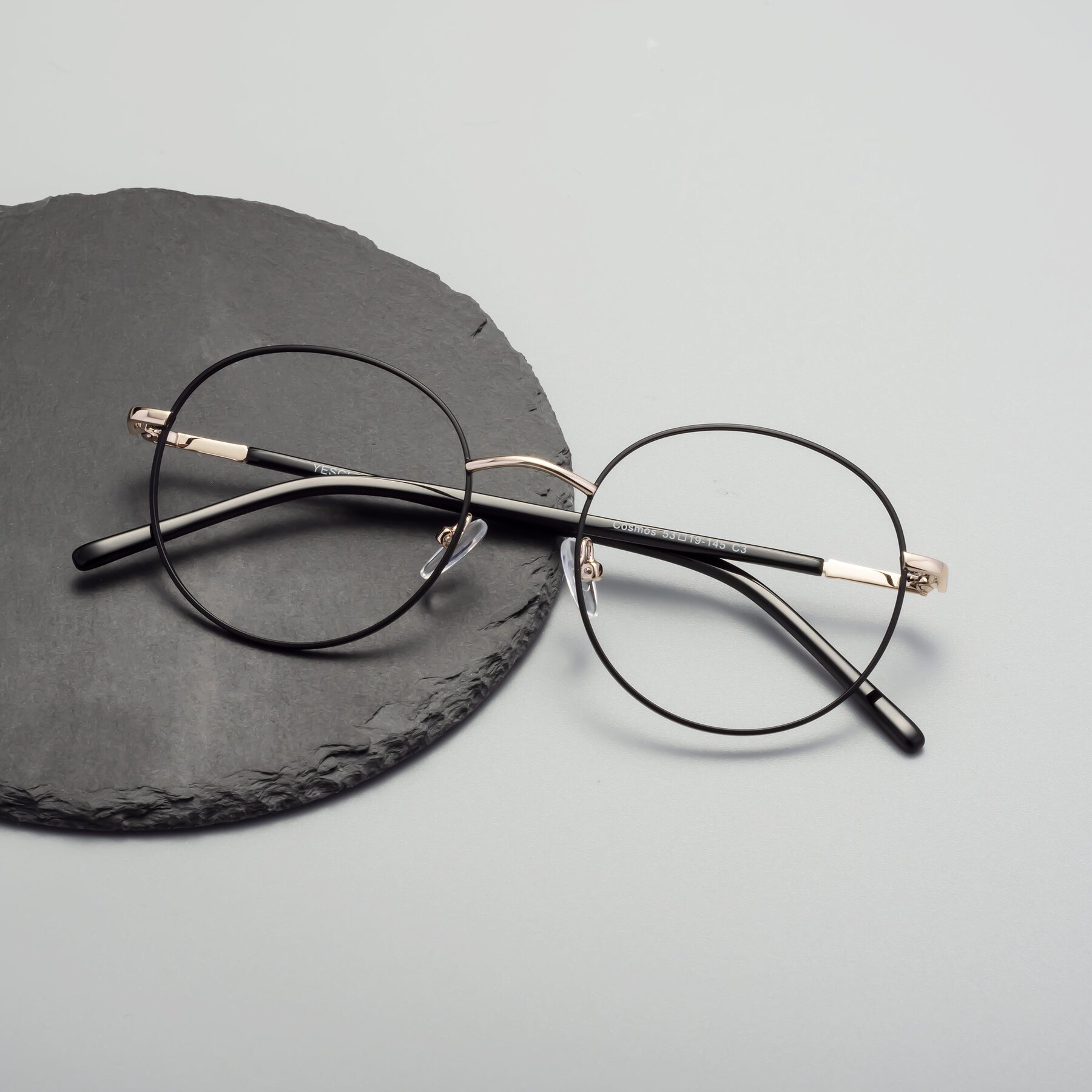 Lifestyle photography #1 of Cosmos in Black-Gold with Clear Eyeglass Lenses